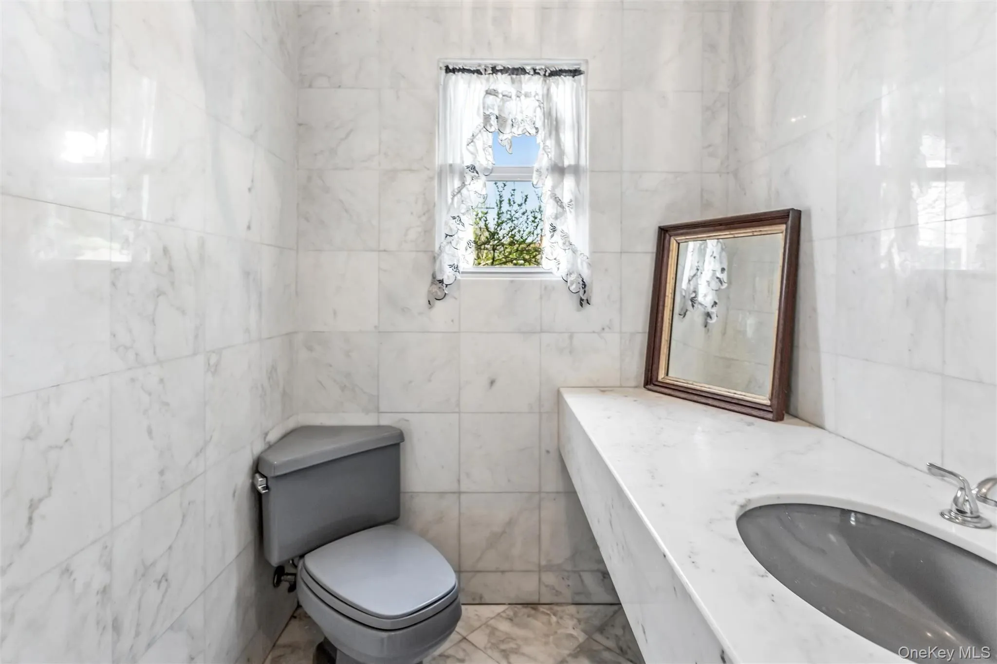 First floor marble half bathroom First floor marble half bathroom