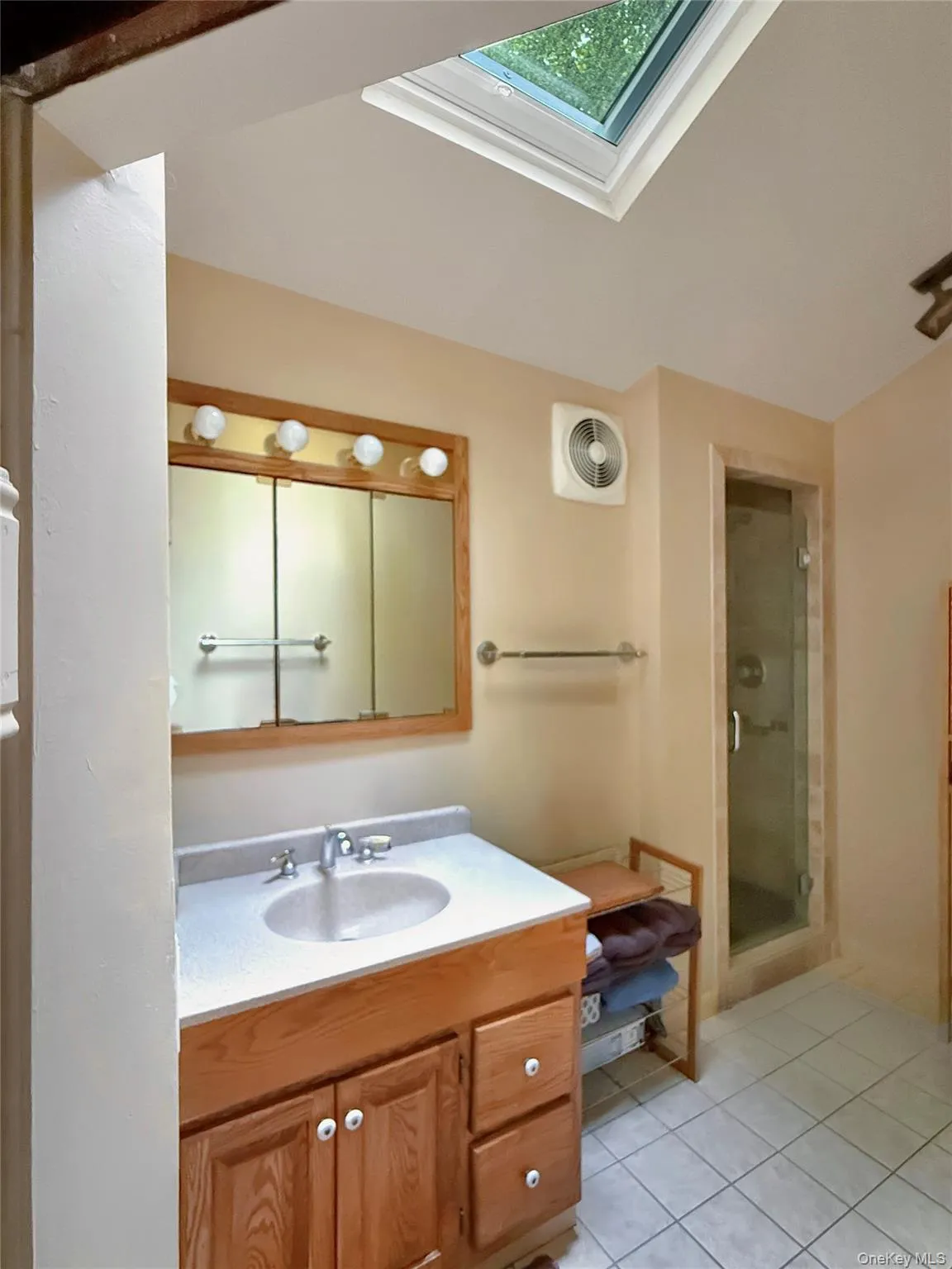 Full bathroom with skylight on second floor Full bathroom with skylight on second floor