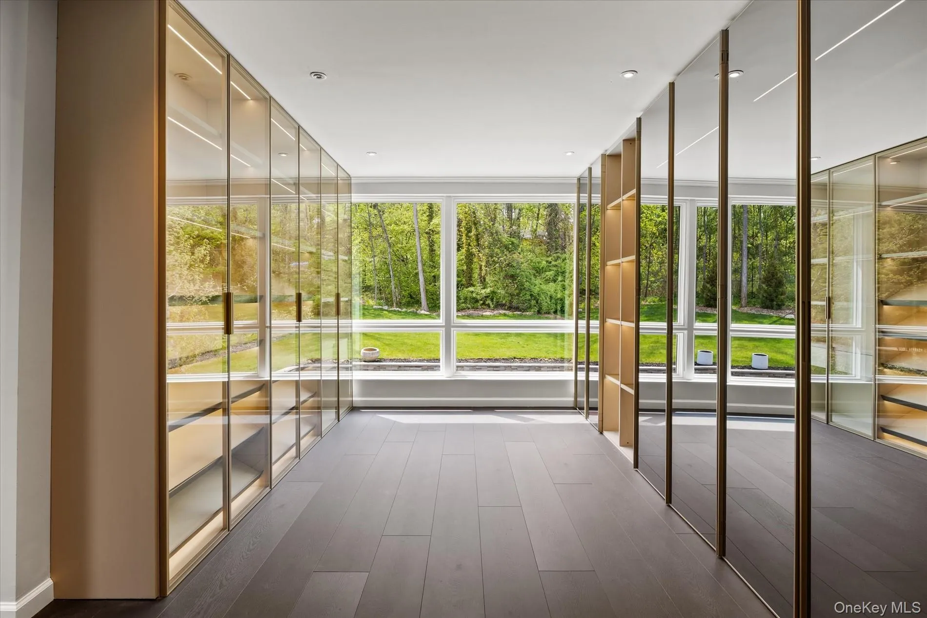 Huge Walk-In closet with Italian Imported Wardrobe Cabinetry Huge Walk-In closet with Italian Imported Wardrobe Cabinetry