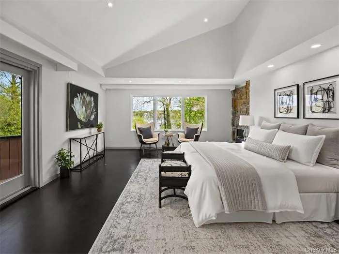 Master Bedroom With Balcony And Waterview Master Bedroom With Balcony And Waterview