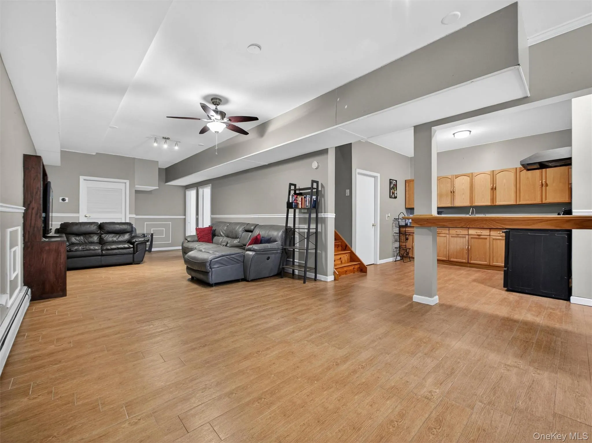 Expansive lower-level recreation area featuring open flexible space ideal for media, gaming, entertaining, or everyday living. Expansive lower-level recreation area featuring open flexible space ideal for media, gaming, entertaining, or everyday living.