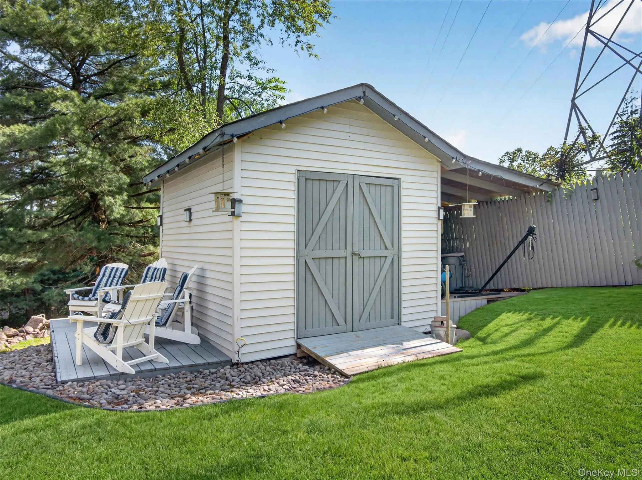 Outdoor storage shed offering additional space for tools, equipment, and seasonal storage needs. Outdoor storage shed offering additional space for tools, equipment, and seasonal storage needs.