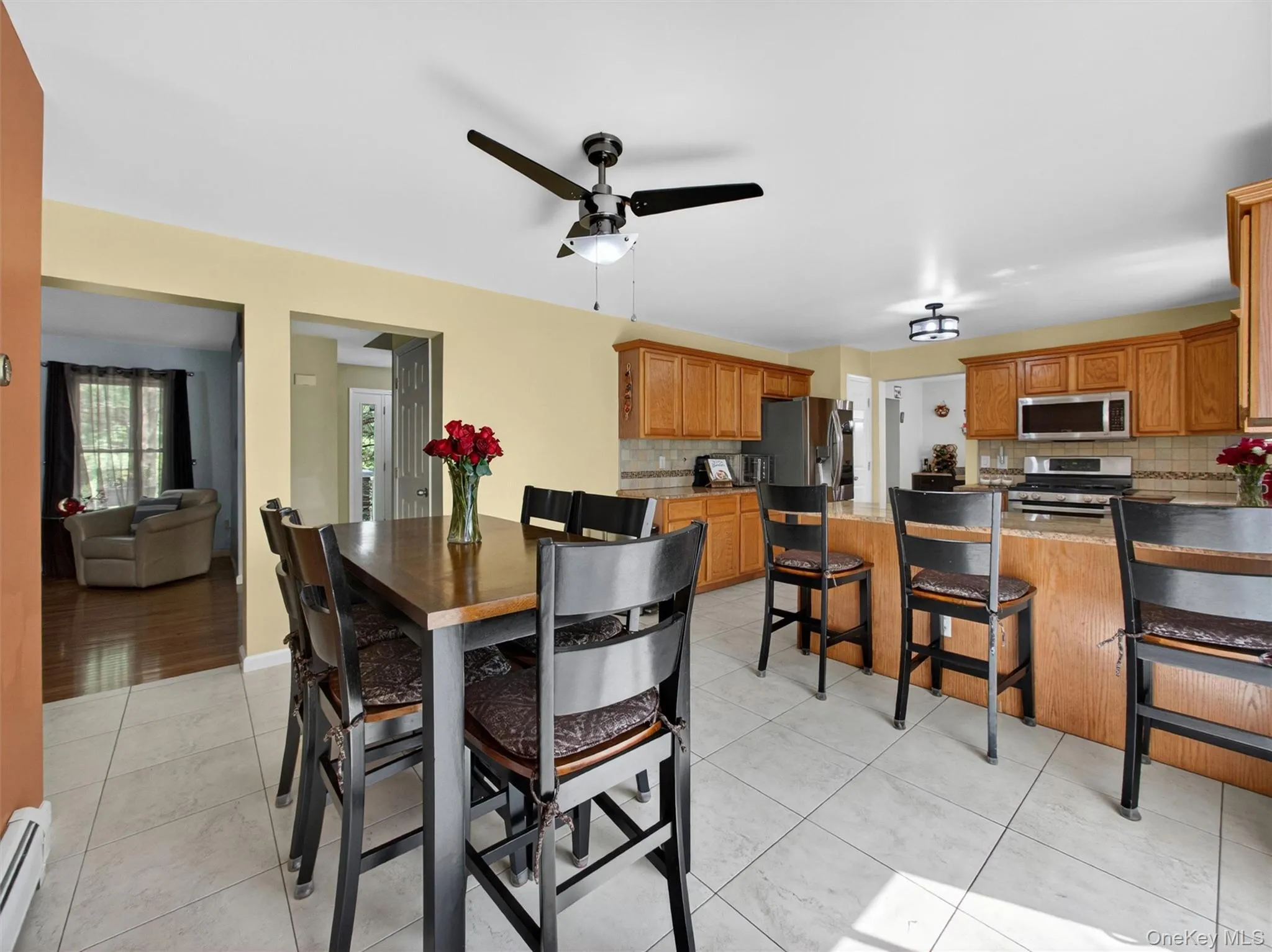 Open eat-in area with abundant natural light and seamless access to outdoor living and entertaining spaces. Open eat-in area with abundant natural light and seamless access to outdoor living and entertaining spaces.
