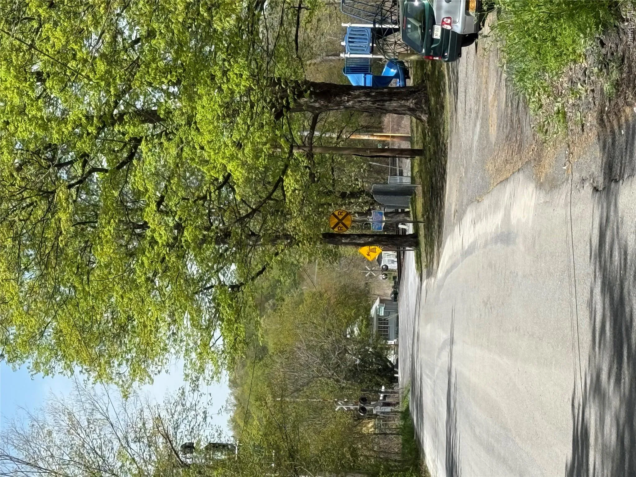 View of road featuring traffic signs View of road featuring traffic signs