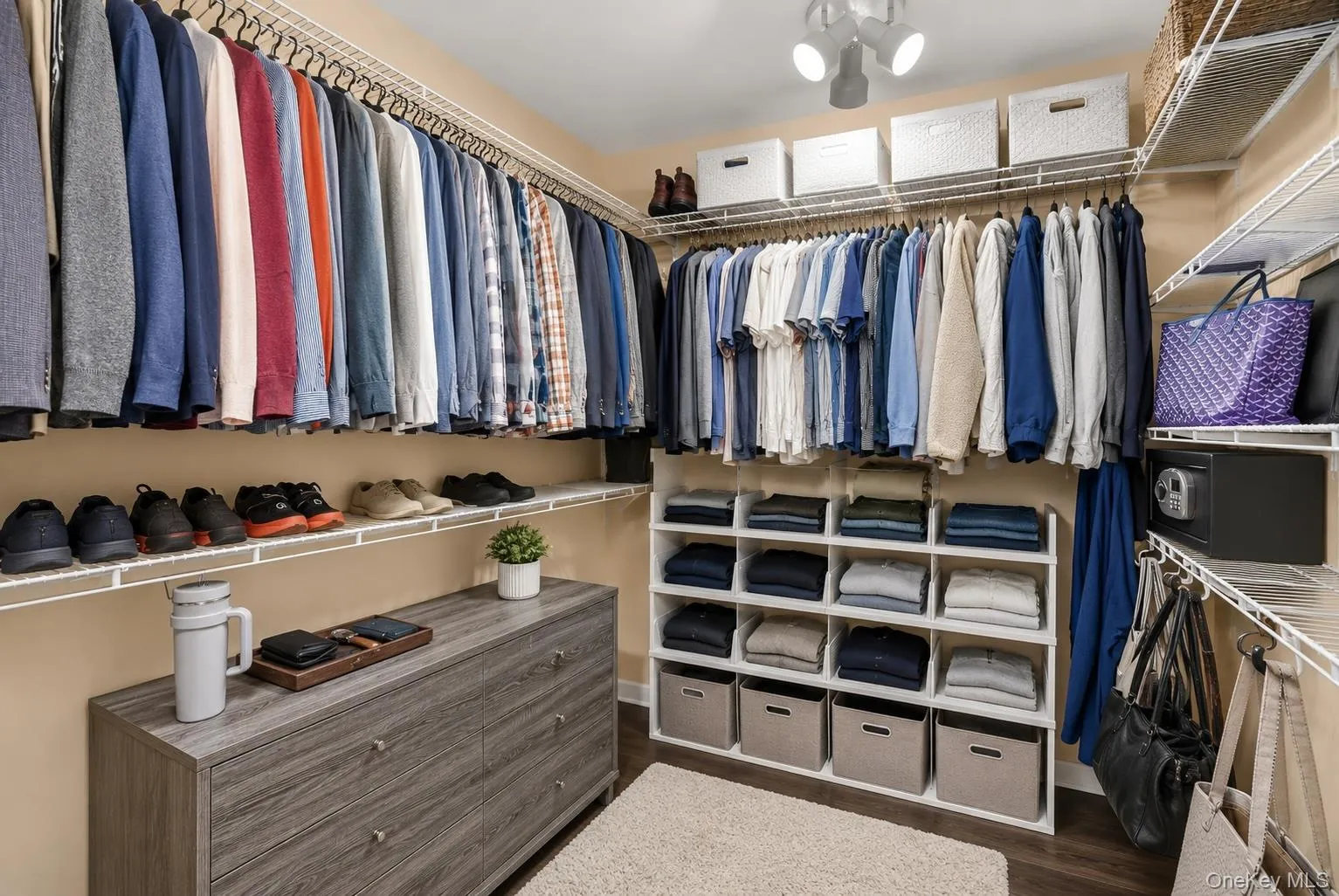 Primary Suite walk-in closet. Primary Suite walk-in closet.