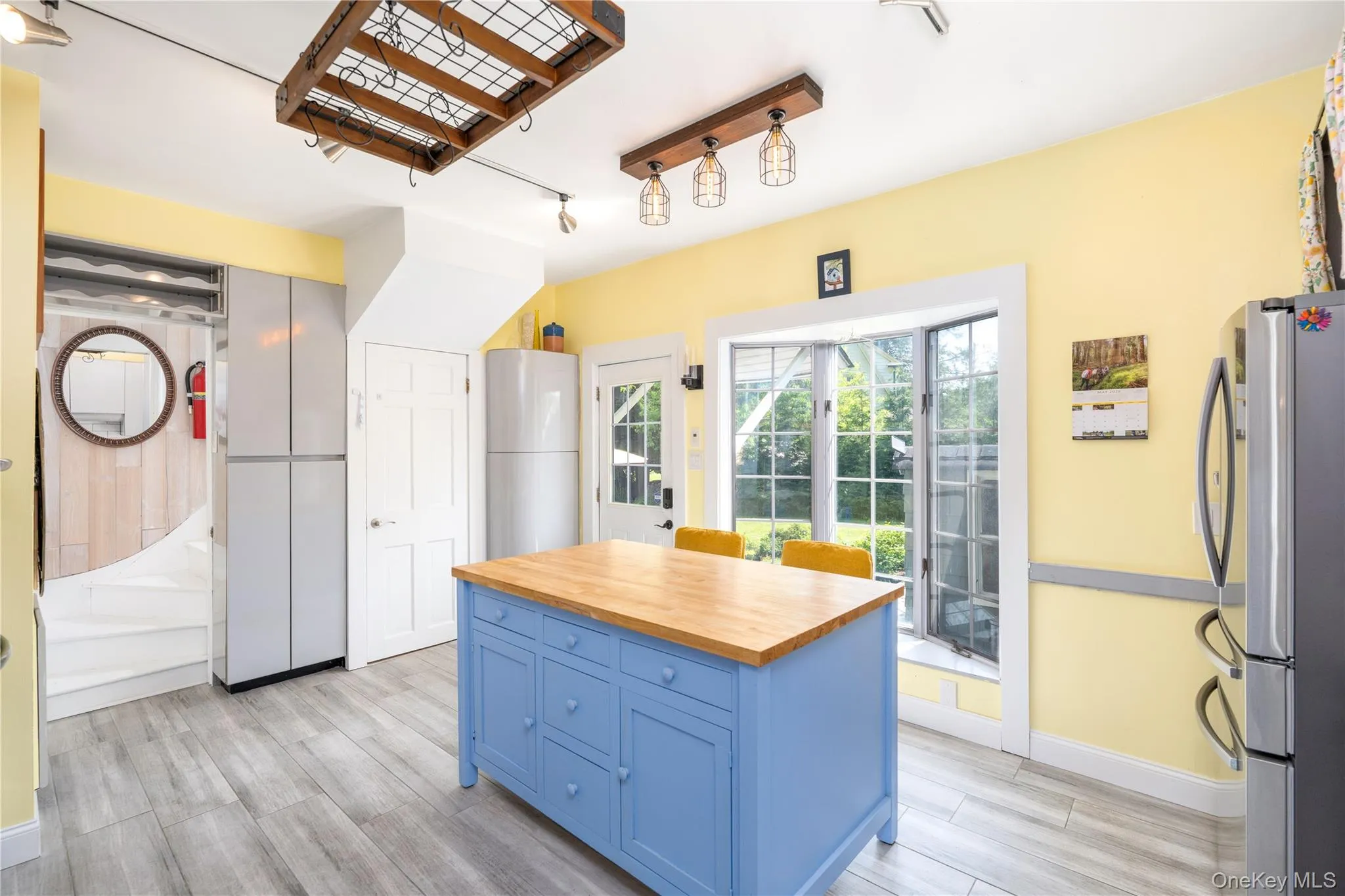 Lots of natural light and center island, staircase to second floor and to basement. Lots of natural light and center island, staircase to second floor and to basement.