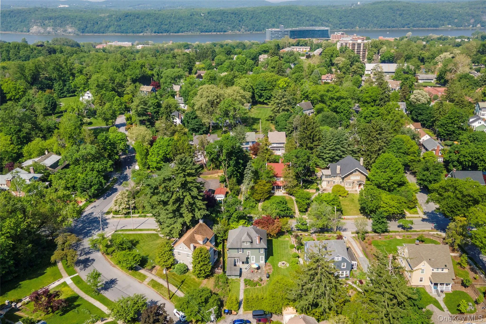 View of house with view of Hudson River in the distance. View of house with view of Hudson River in the distance.