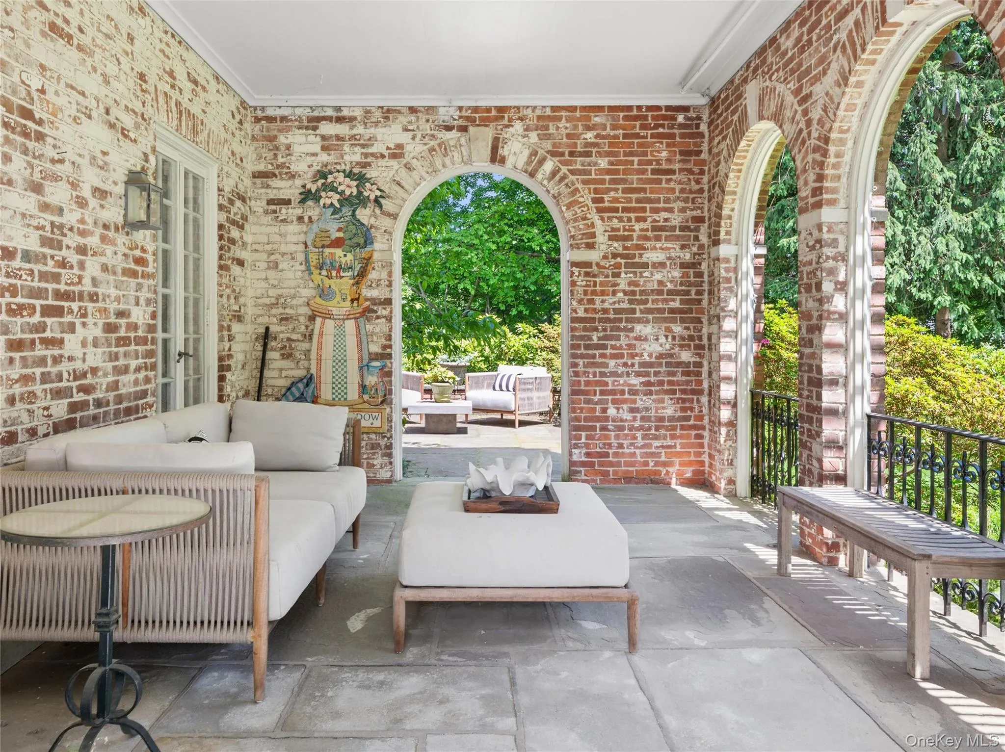 Covered loggia facing park like property Covered loggia facing park like property