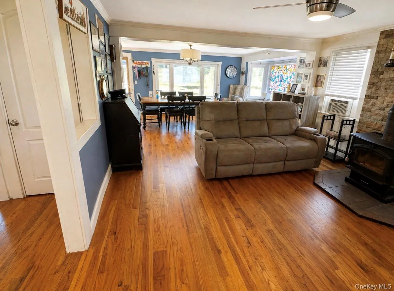 Hardwood flooring extending throughout the living and dining areas Hardwood flooring extending throughout the living and dining areas