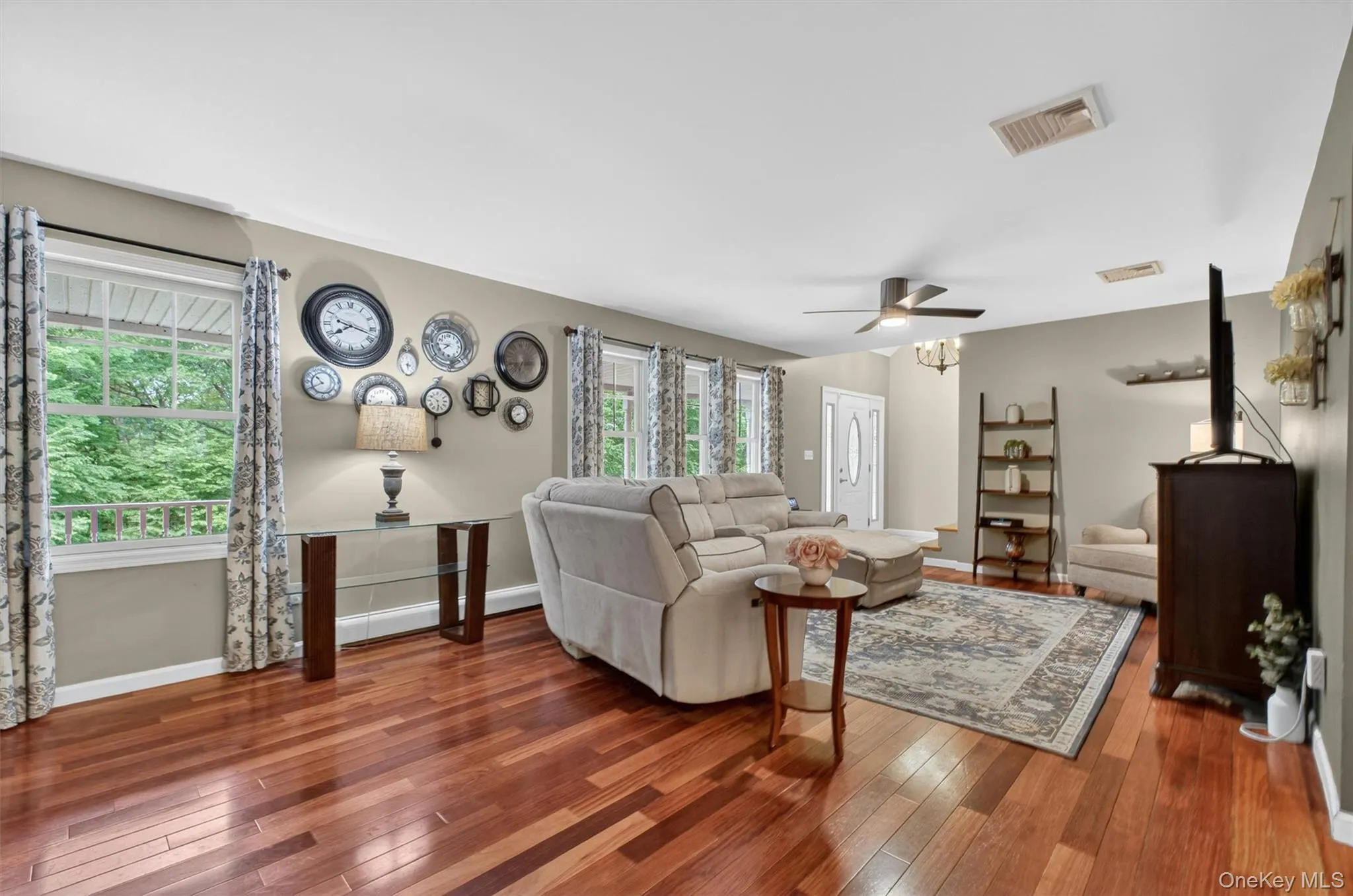 Cherry wood floors in main living room and dining room Cherry wood floors in main living room and dining room