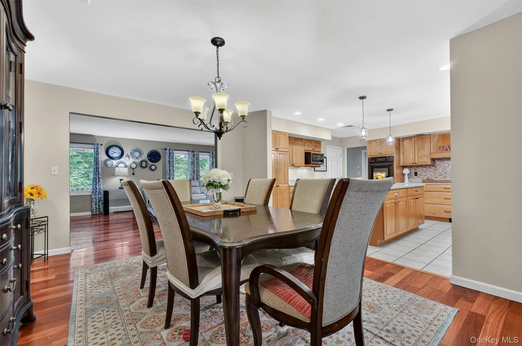 Cherry wood floors in main living room and dining room Cherry wood floors in main living room and dining room