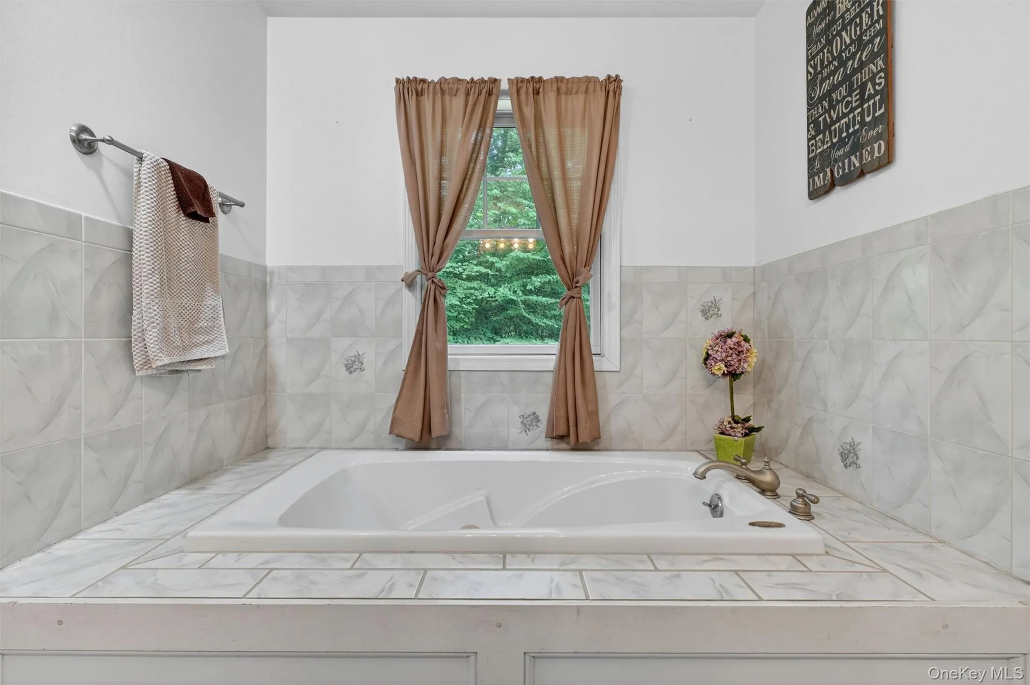 Master bathroom on first floor - ceramic tiling, Jacuzzi tub, shower Master bathroom on first floor - ceramic tiling, Jacuzzi tub, shower