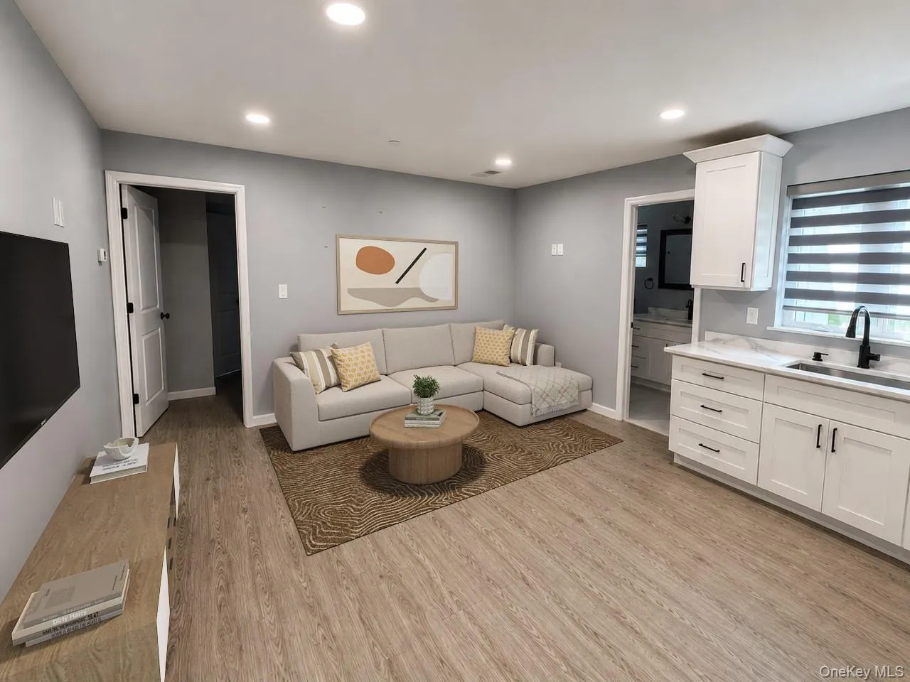 virtually staged kitchen/living room space virtually staged kitchen/living room space
