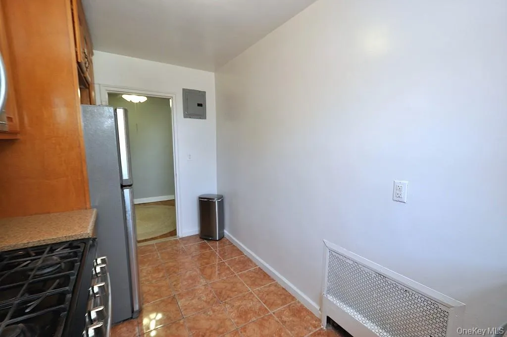 The large kitchen has granite counters and stainless steel appliances. The kitchen is approx 12'-8" x 7'-2". The large kitchen has granite counters and stainless steel appliances. The kitchen is approx 12'-8" x 7'-2".
