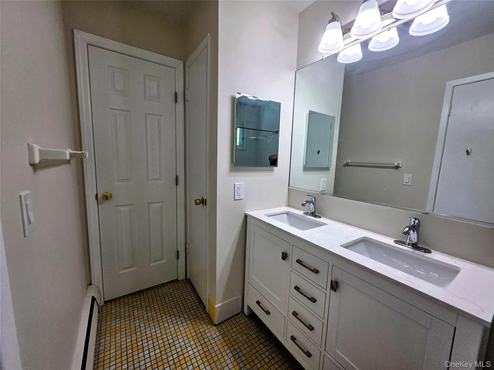 New double vanity sink, lite fixture & medicine cabinet. New double vanity sink, lite fixture & medicine cabinet.