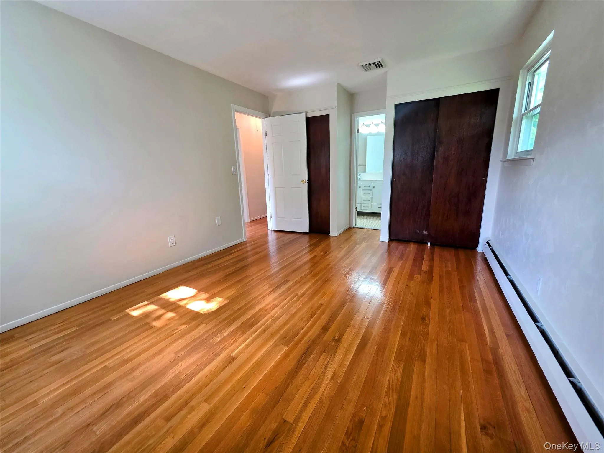 Large enough to fit a king size bed. Double entry to bathroom. Large enough to fit a king size bed. Double entry to bathroom.