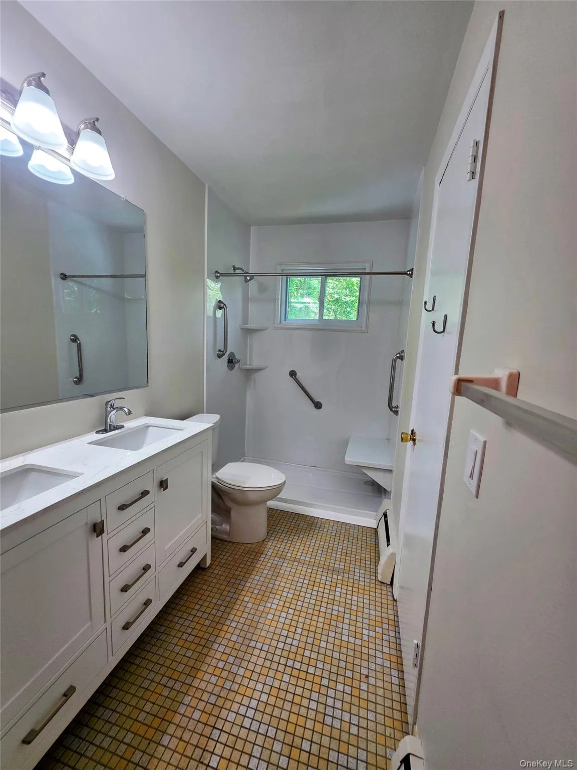 Double entry bathroom to Primary bedroom. Sit down shower. Double entry bathroom to Primary bedroom. Sit down shower.