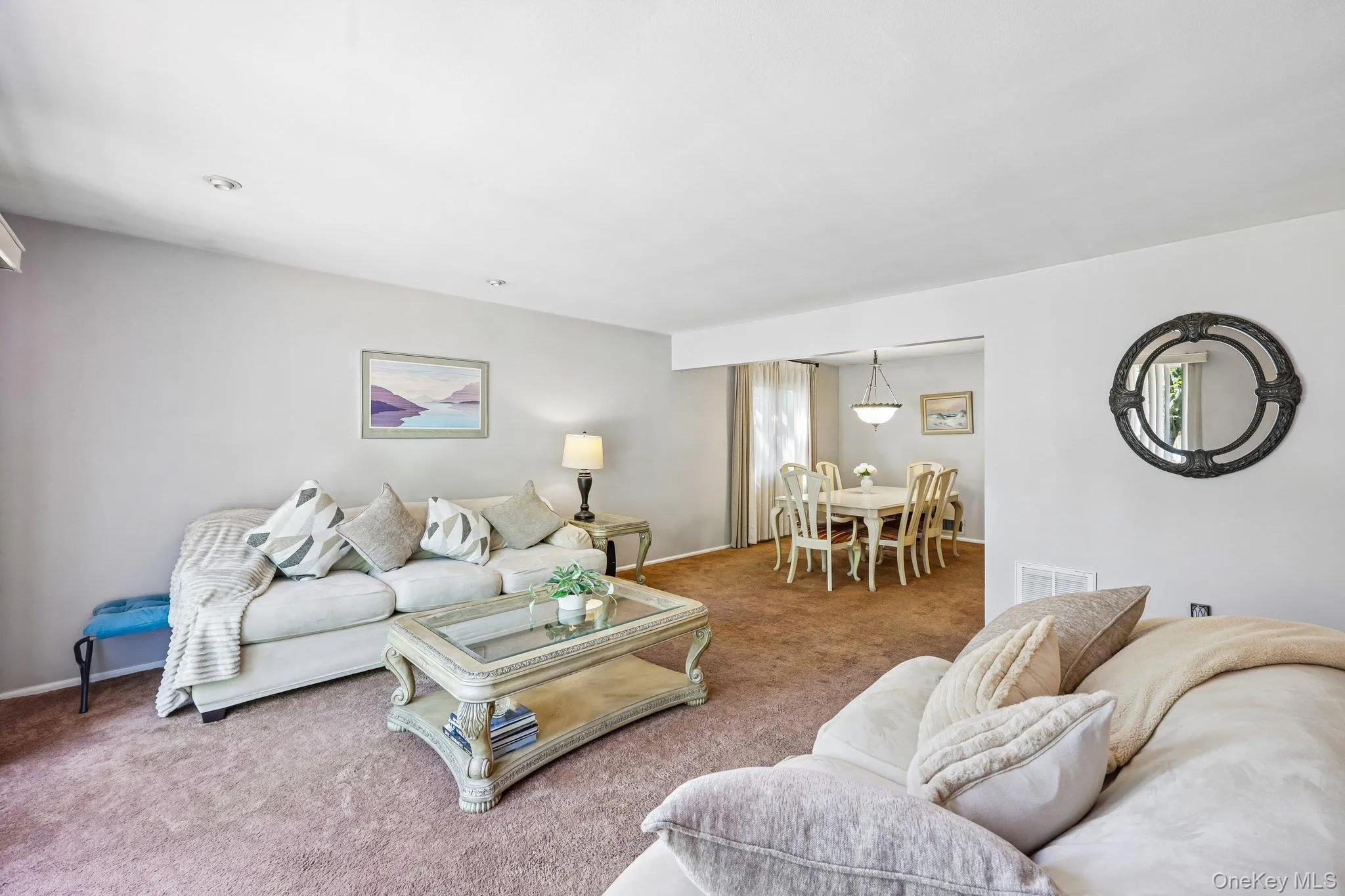 Sunny Open Living & Dining Room, carpeting over Oak flooring, high hats & chandelier Sunny Open Living & Dining Room, carpeting over Oak flooring, high hats & chandelier