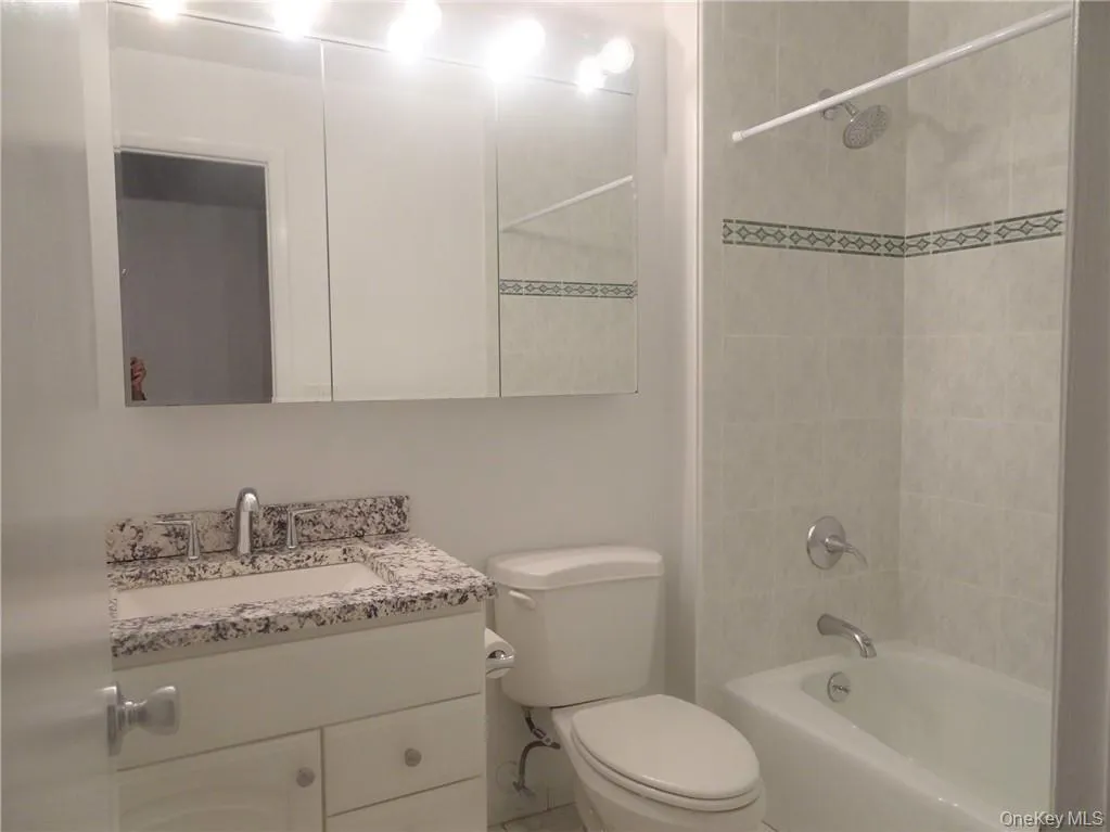 Hall Bathroom across from the second bedroom. Hall Bathroom across from the second bedroom.