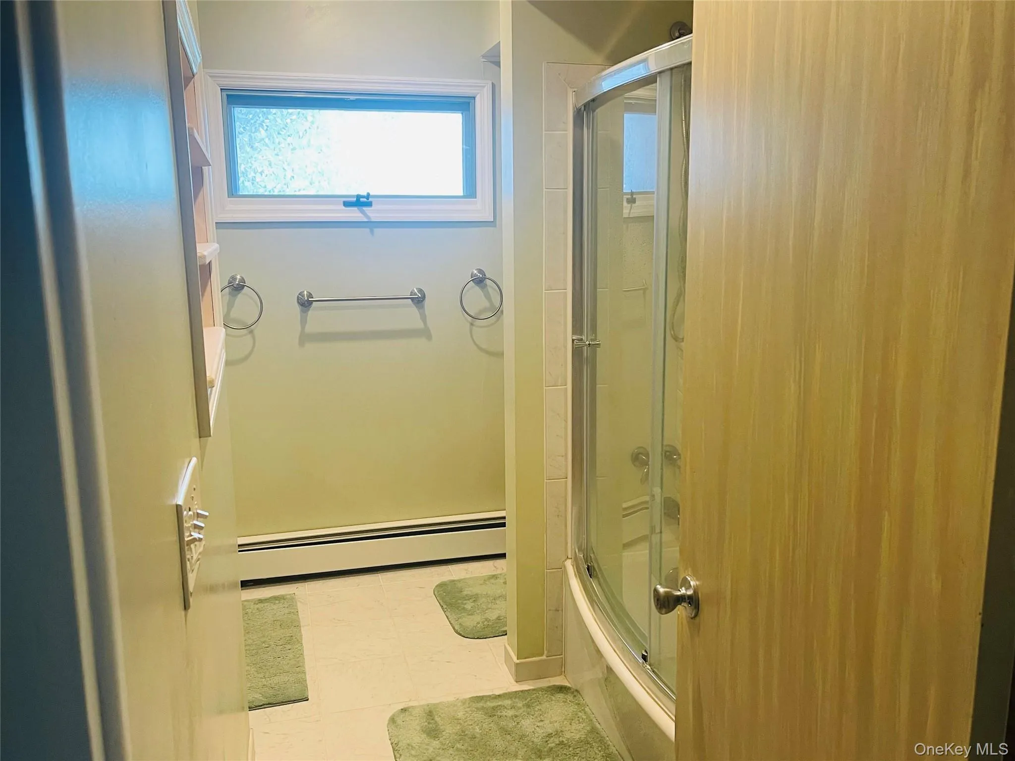 Full Bathroom with soaking tub located in hallway. Full Bathroom with soaking tub located in hallway.