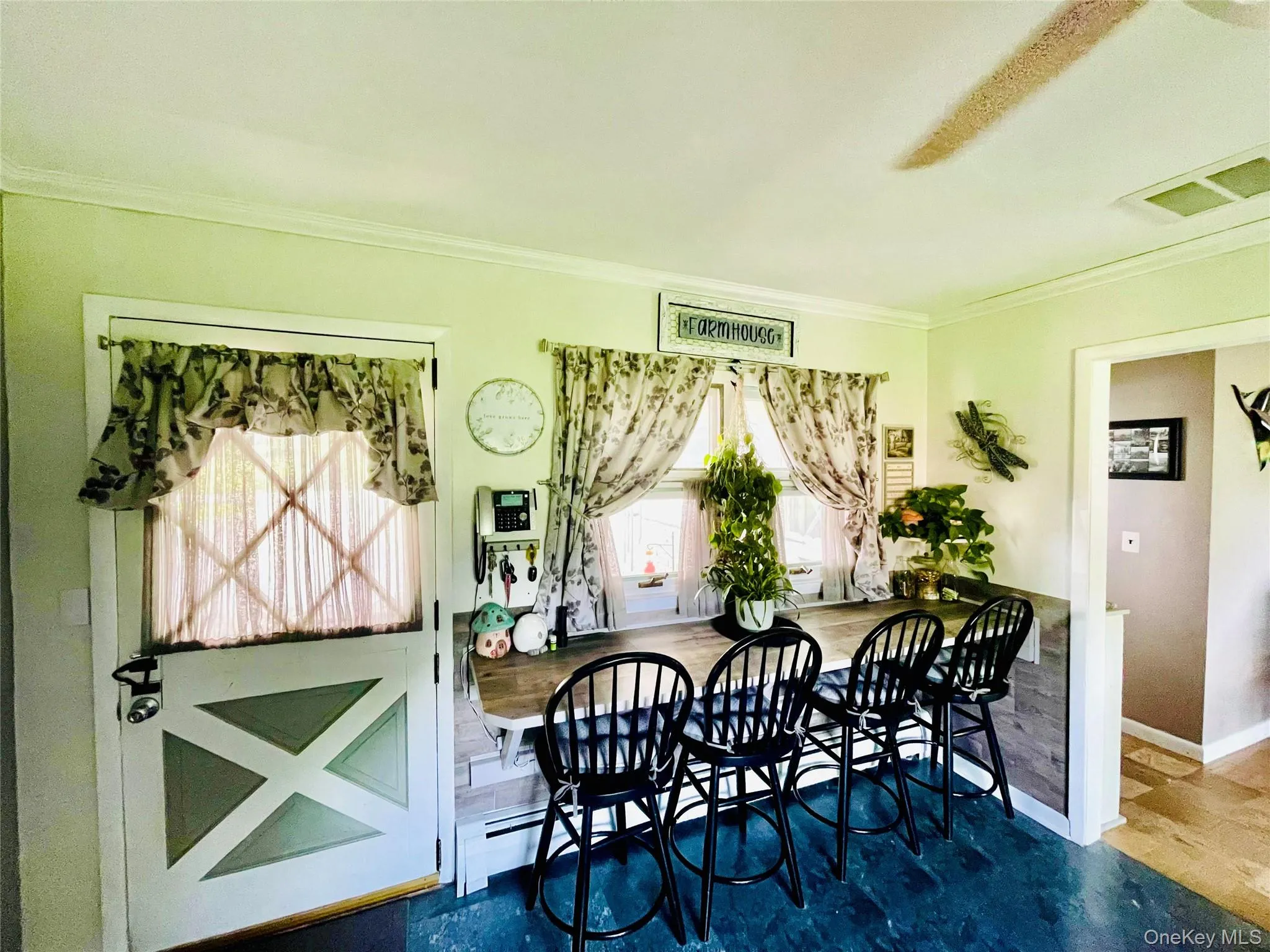 Front entrance Dutch Country Door, Breakfast Bar and vinyl tile flooring . Front entrance Dutch Country Door, Breakfast Bar and vinyl tile flooring .