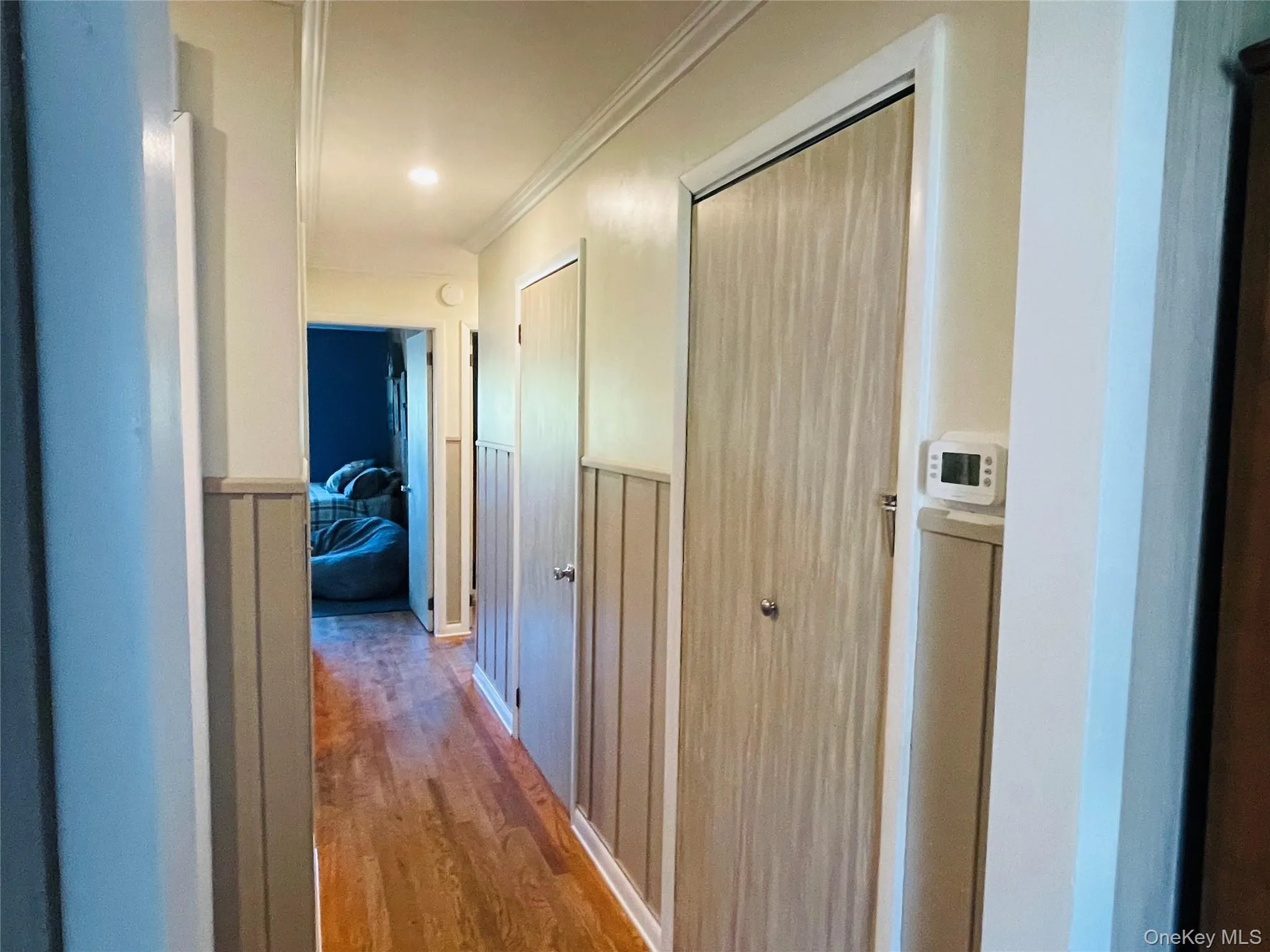 Hallway showing access to cedar closet, basement and storage closets Hallway showing access to cedar closet, basement and storage closets