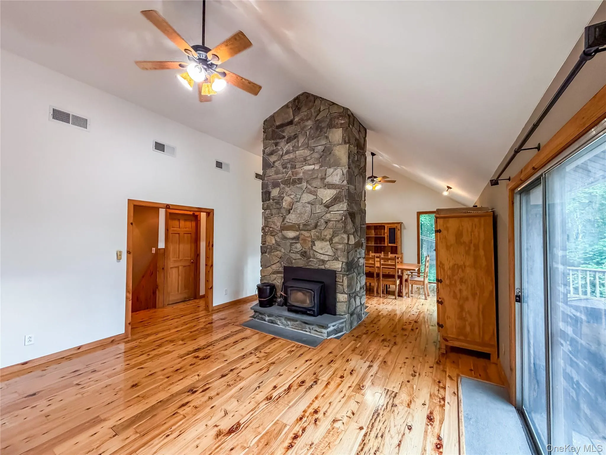 Double sided stone fireplace-Living room view Double sided stone fireplace-Living room view