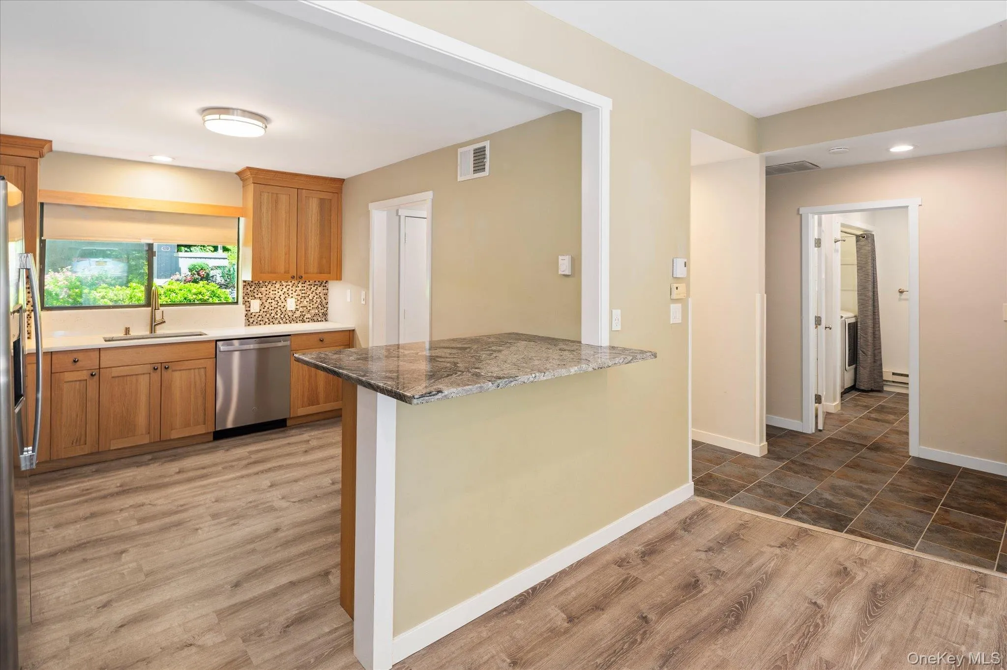 Entry to Kitchen with Counter Island Entry to Kitchen with Counter Island