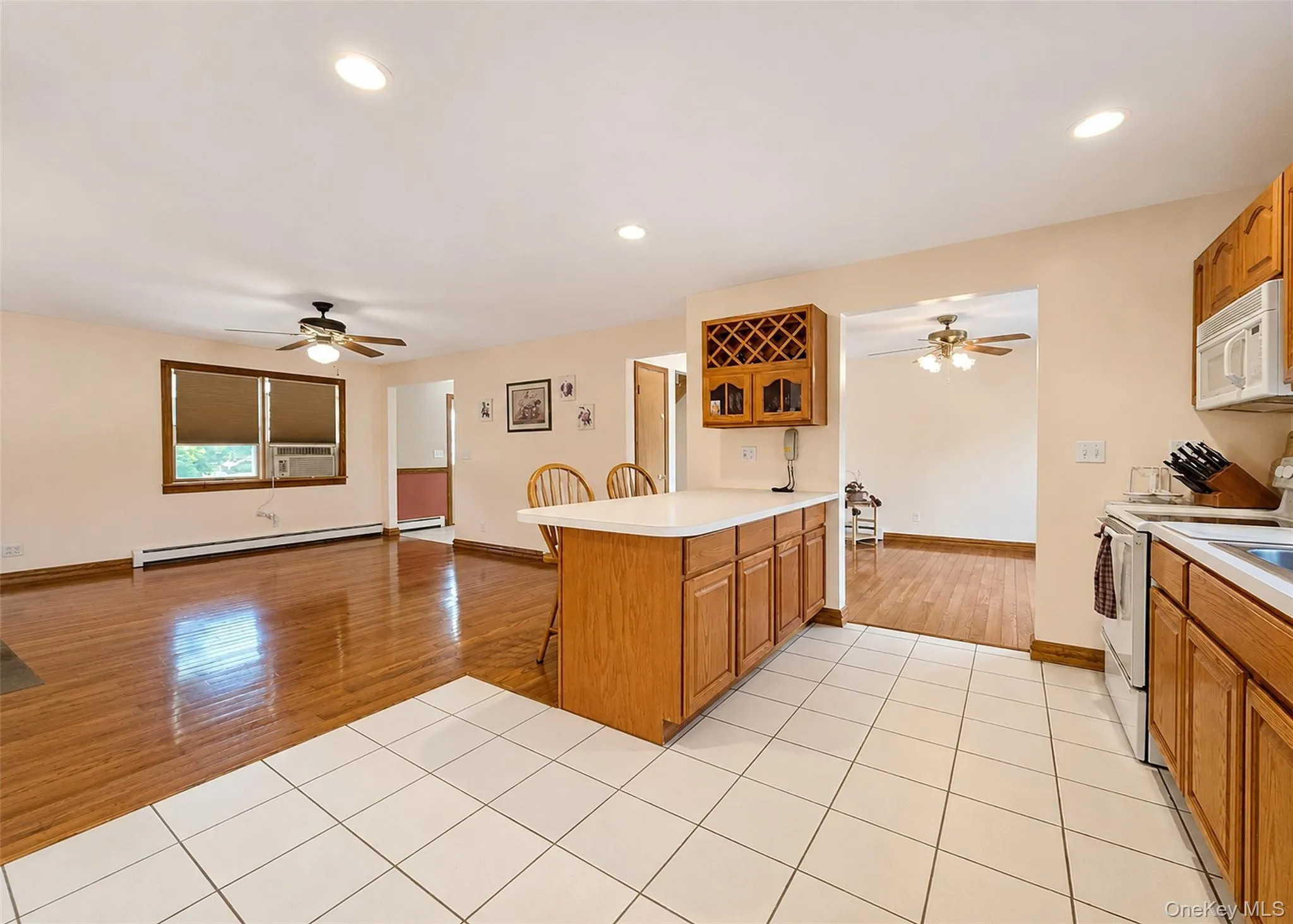 Kitchen looking into living room and dining room Kitchen looking into living room and dining room