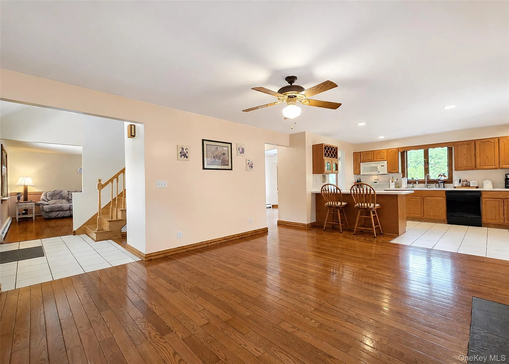 Living Room looking into dining room and family room Living Room looking into dining room and family room