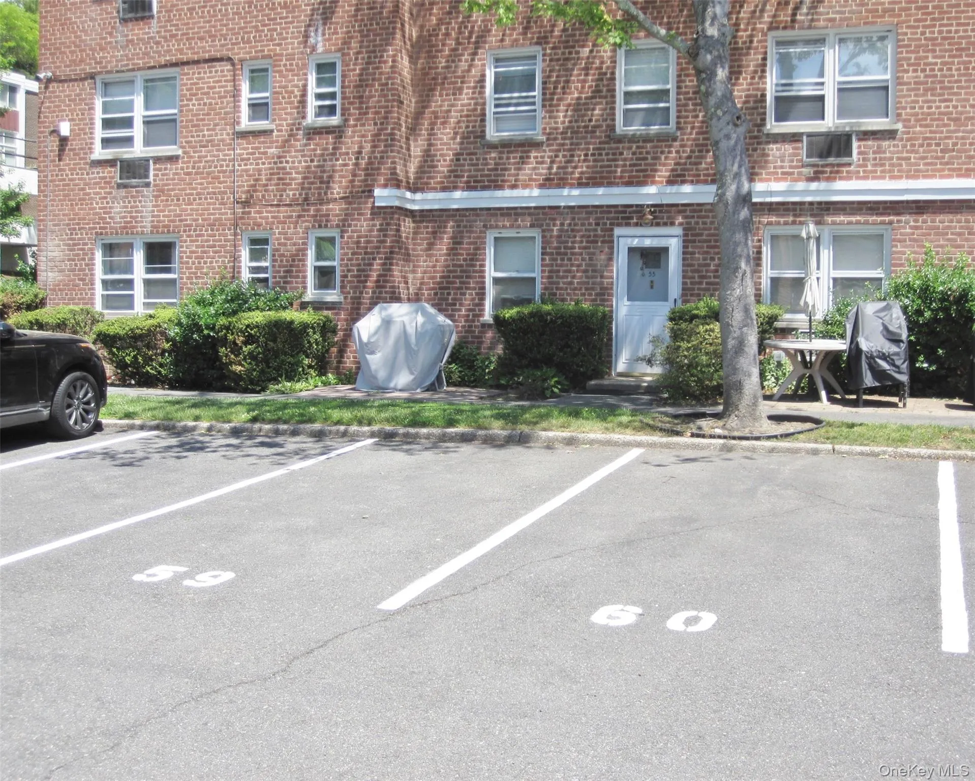 First floor corner unit that is seen in the photo from the left to the right. First floor corner unit that is seen in the photo from the left to the right.