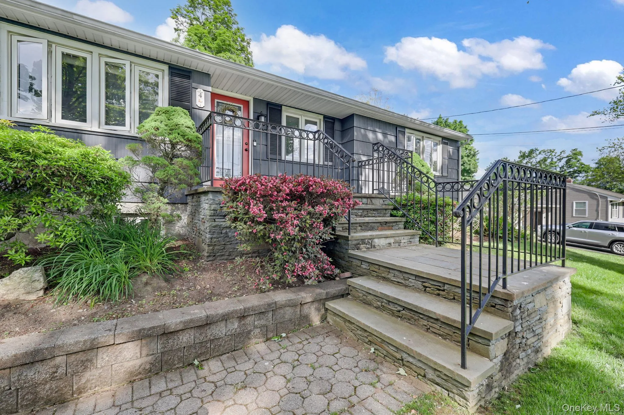 Inviting entrance with Decorative Wrought Iron Railing Inviting entrance with Decorative Wrought Iron Railing