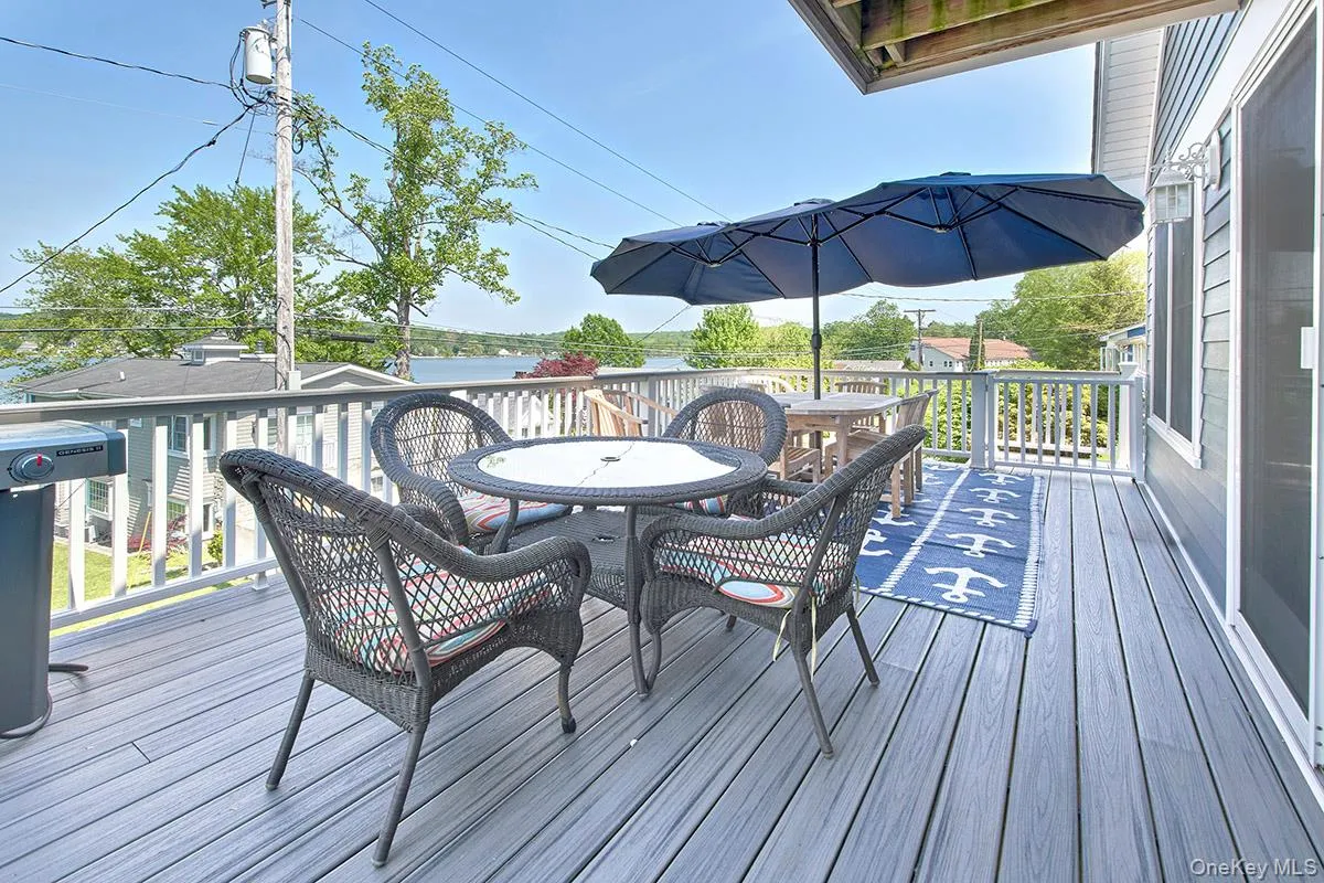 Spacious elevated deck with composite decking and painted railings with spectacular views Spacious elevated deck with composite decking and painted railings with spectacular views