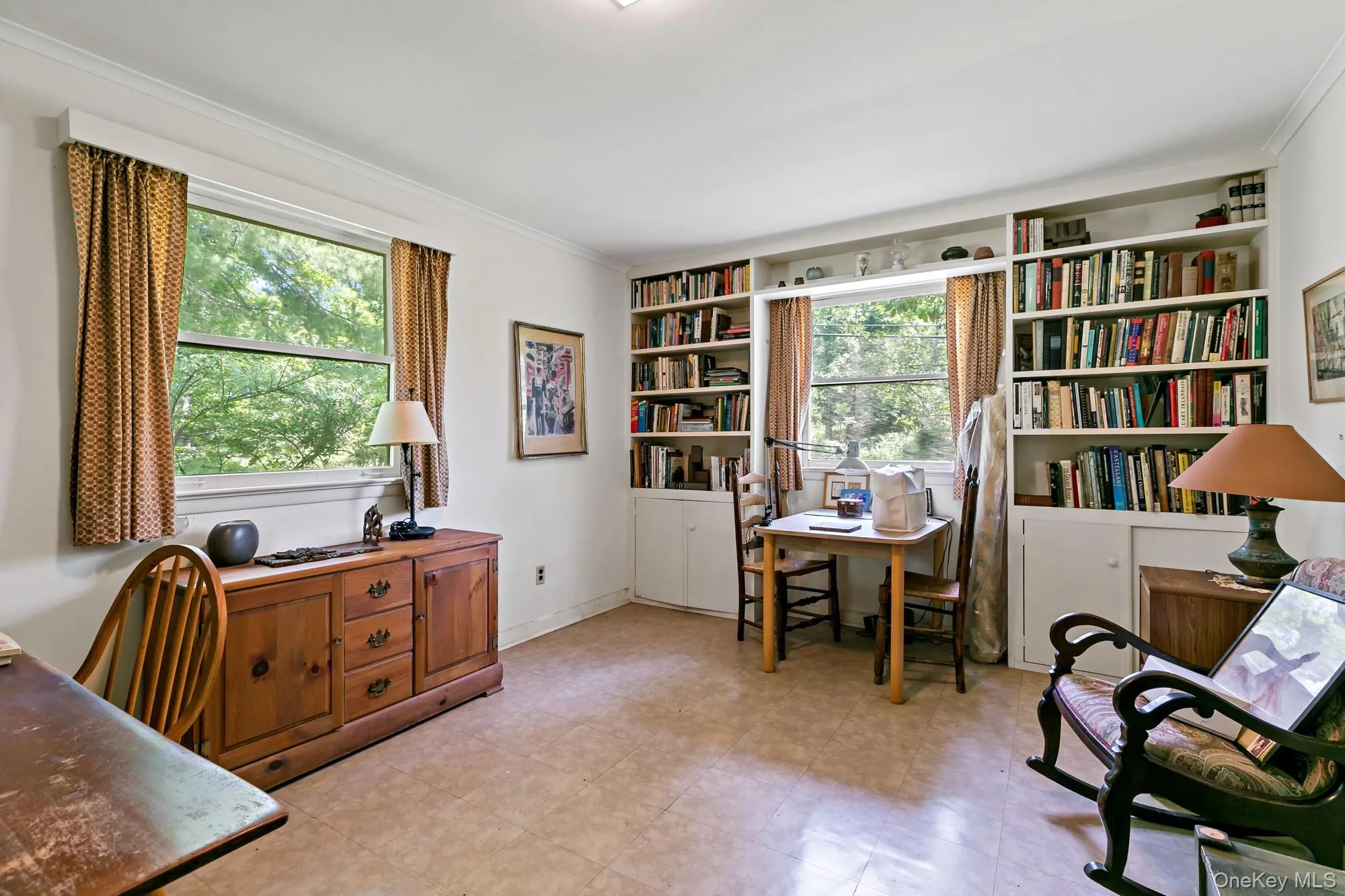 Third bedroom being used as library/office. Third bedroom being used as library/office.