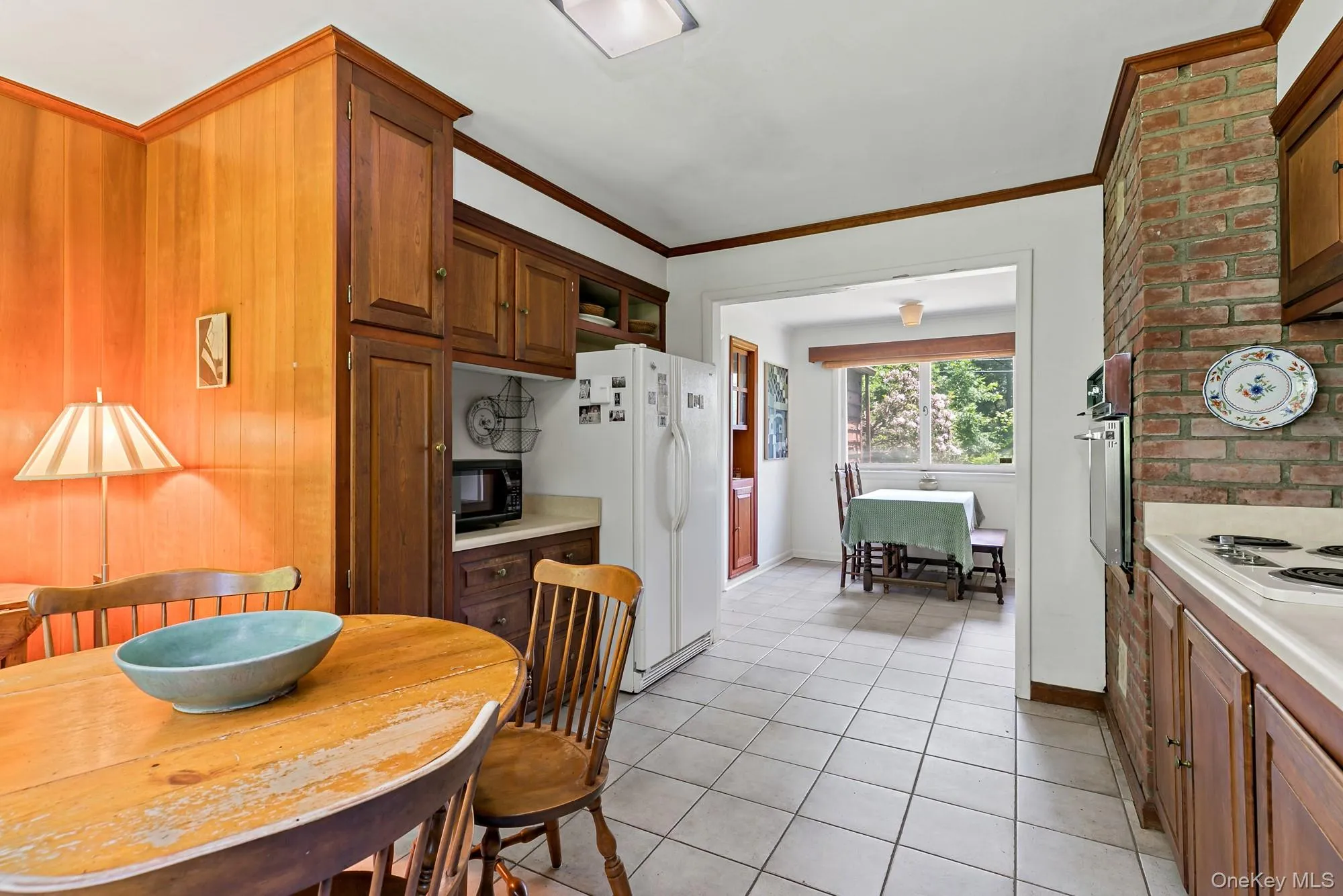 Eat in kitchen looking through to the formal dining area. Eat in kitchen looking through to the formal dining area.