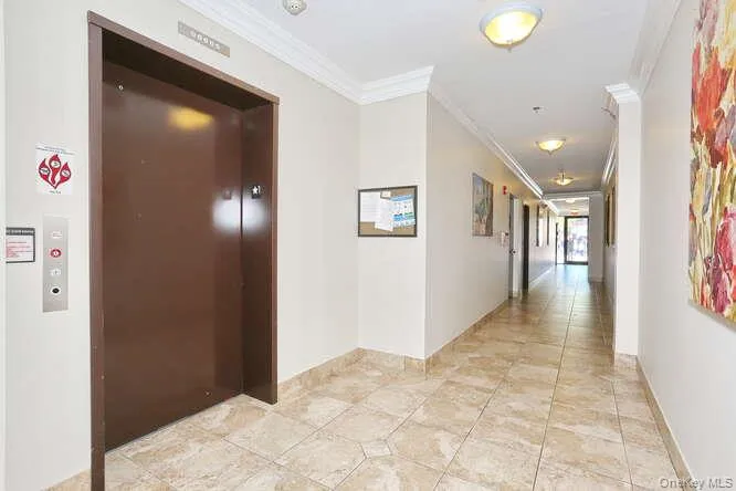 Corridor with elevator and crown molding Corridor with elevator and crown molding