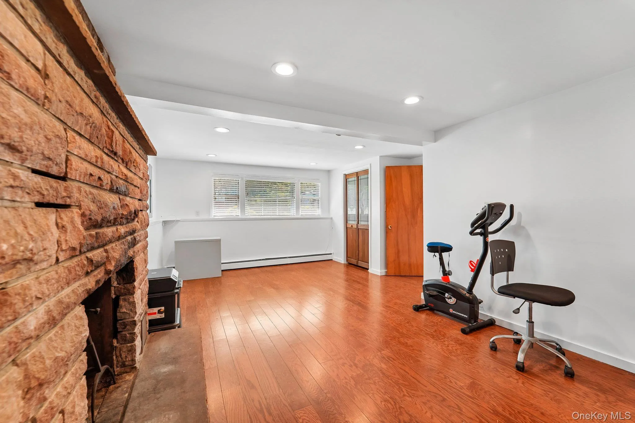 Family Room with Wood Burning Fireplace Family Room with Wood Burning Fireplace