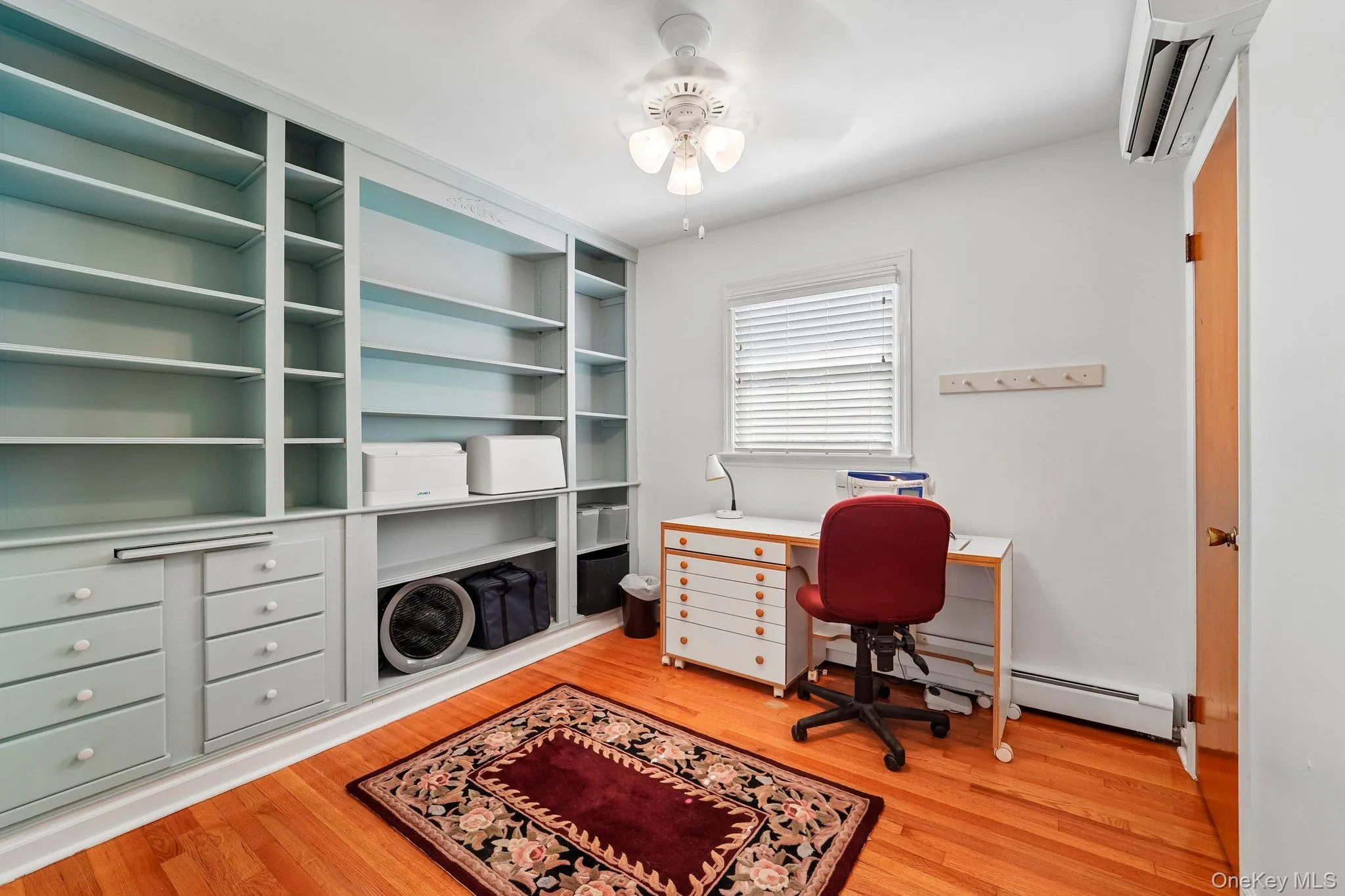 3rd Bedroom with Built-Ins currently being used as craft room/office 3rd Bedroom with Built-Ins currently being used as craft room/office
