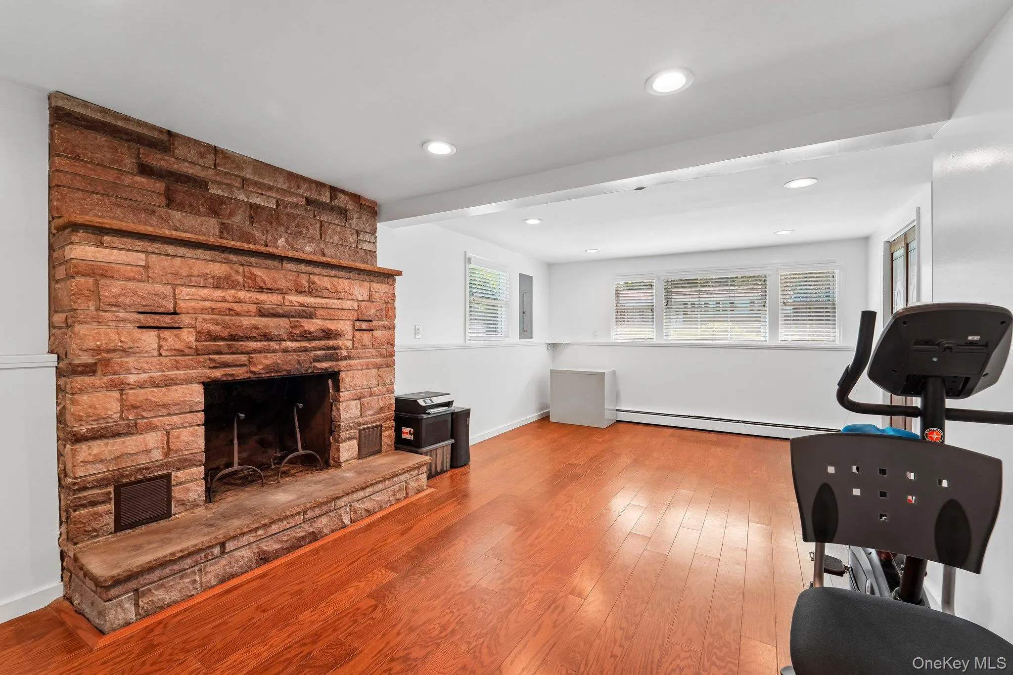 Family Room with Wood Burning Fireplace Family Room with Wood Burning Fireplace