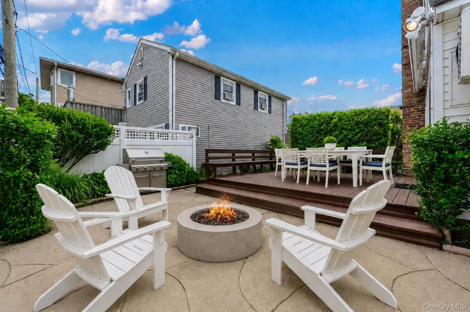 Virtually Staged Deck off Dining Room and Back Yard Virtually Staged Deck off Dining Room and Back Yard