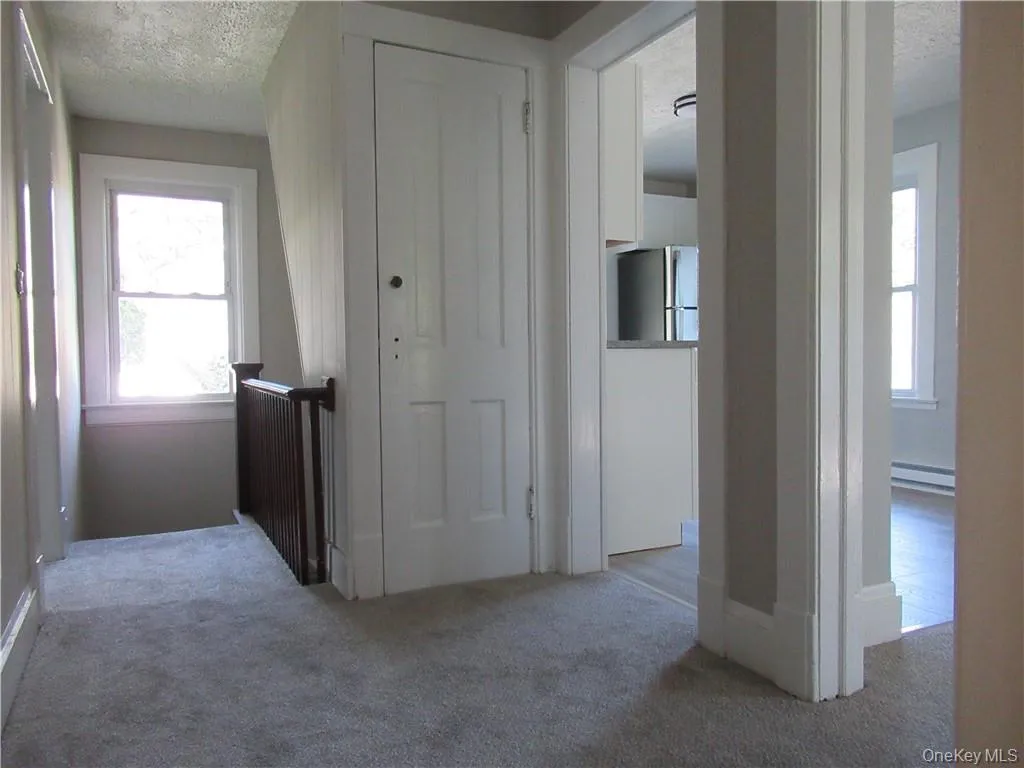 Hall leads to bedrooms and bathroom Hall leads to bedrooms and bathroom