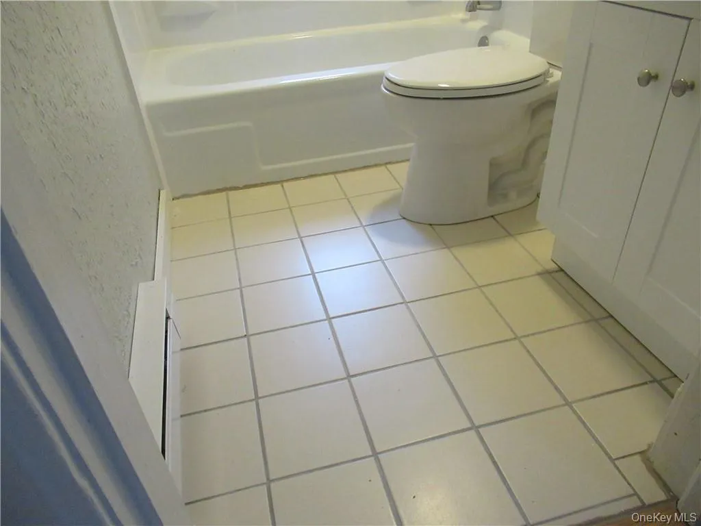 Tile floor - newer vanity Tile floor - newer vanity