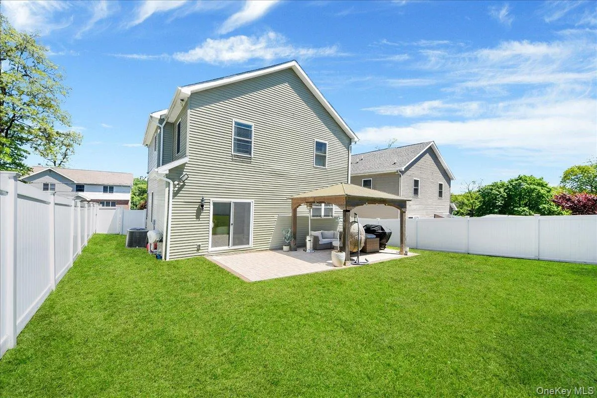 Rear View, Fenced-in Private Backyard, and Patio Rear View, Fenced-in Private Backyard, and Patio