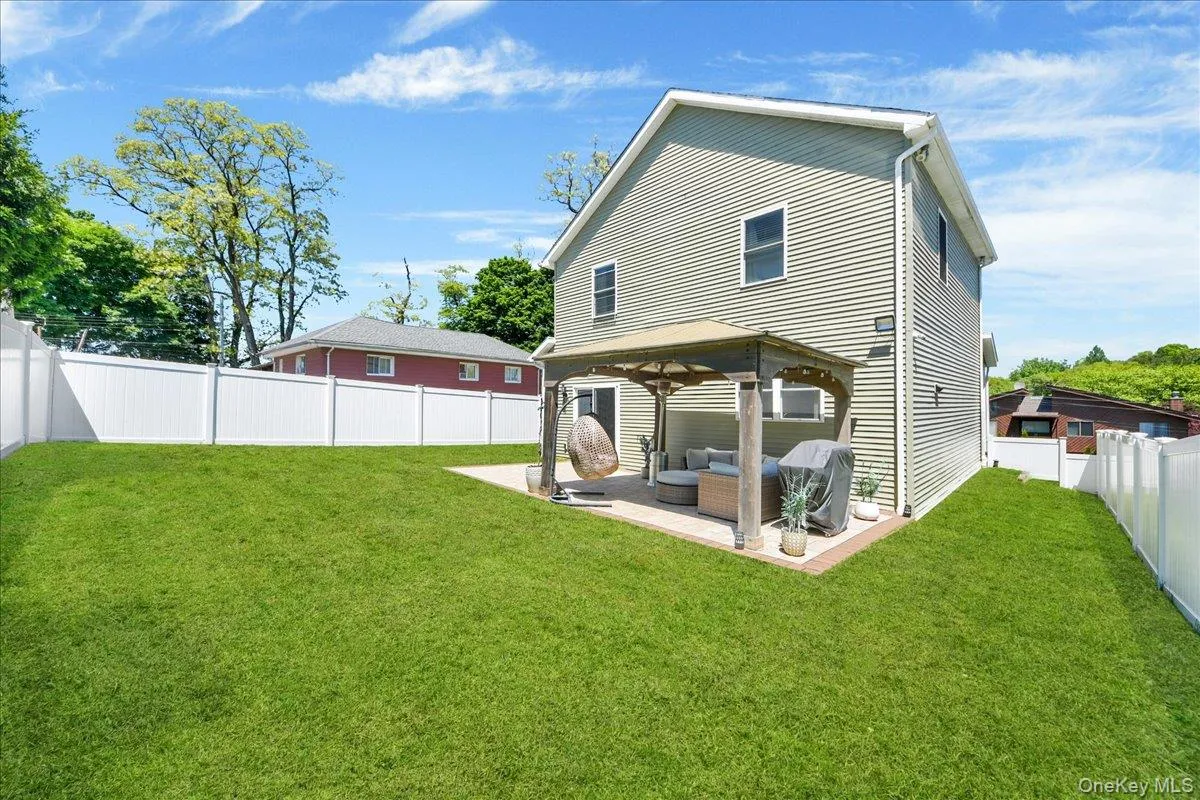 Rear View, Fenced-in Private Backyard, and Patio Rear View, Fenced-in Private Backyard, and Patio