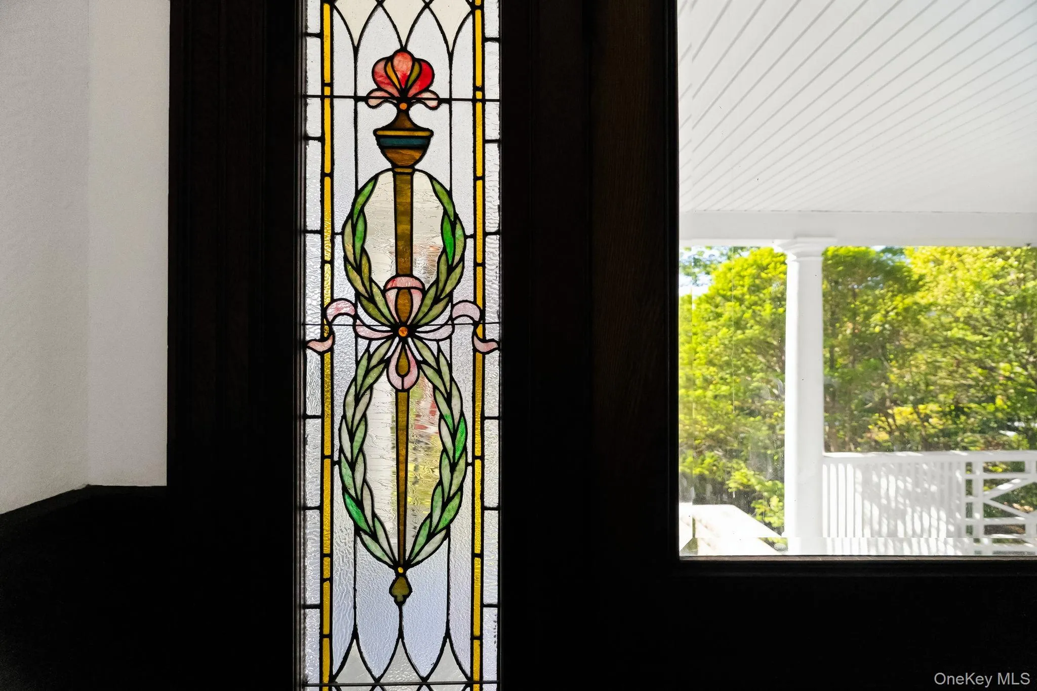 Decorative leaded glass reflects the home's historic pedigree. Decorative leaded glass reflects the home's historic pedigree.