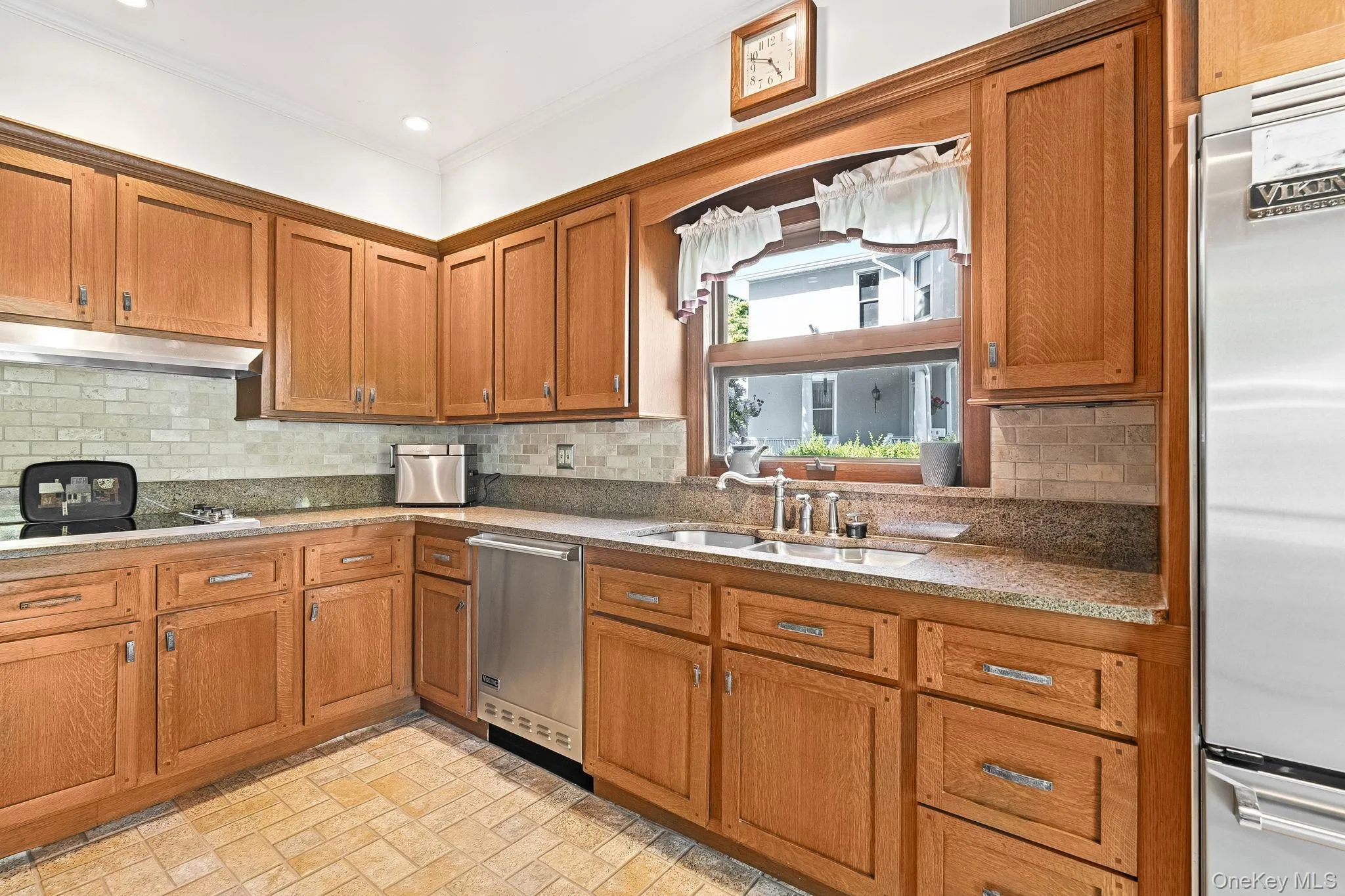 Modern shaker cabinetry and high-end finishes create a timeless culinary space. Modern shaker cabinetry and high-end finishes create a timeless culinary space.