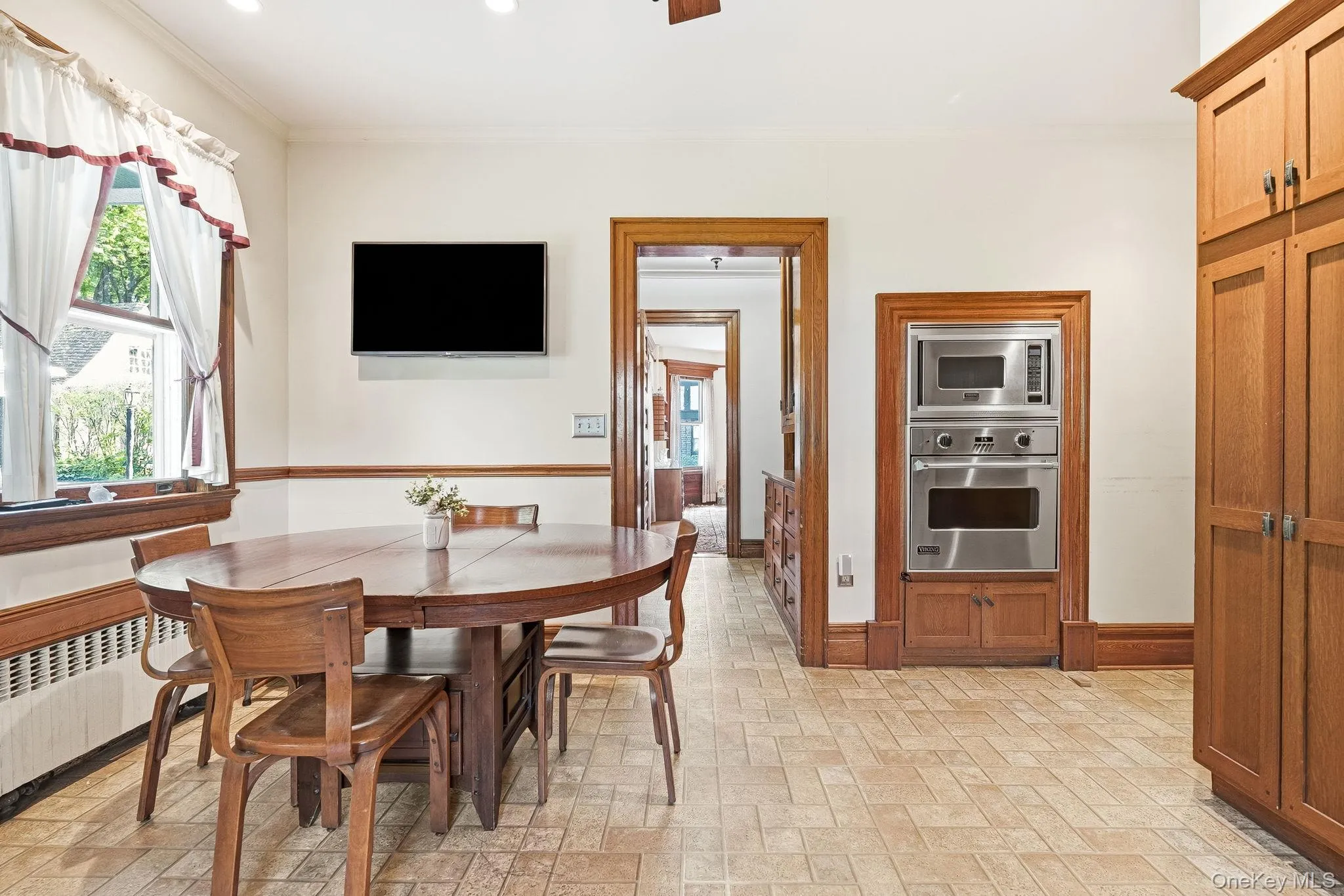 A beautifully updated kitchen where historic charm meets modern convenience. A beautifully updated kitchen where historic charm meets modern convenience.