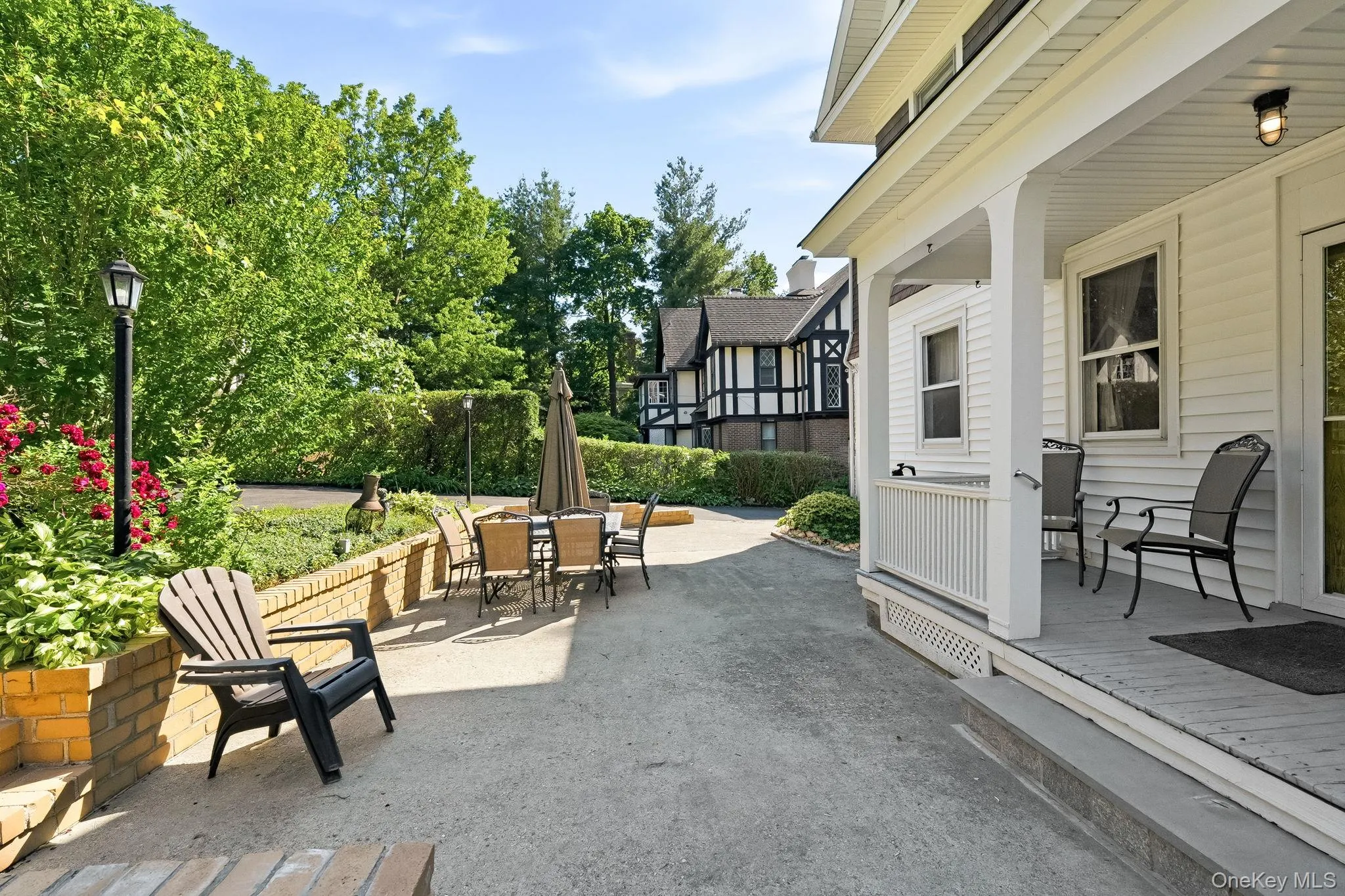 Covered porch, patio area, and lush surroundings create the perfect outdoor escape. Covered porch, patio area, and lush surroundings create the perfect outdoor escape.