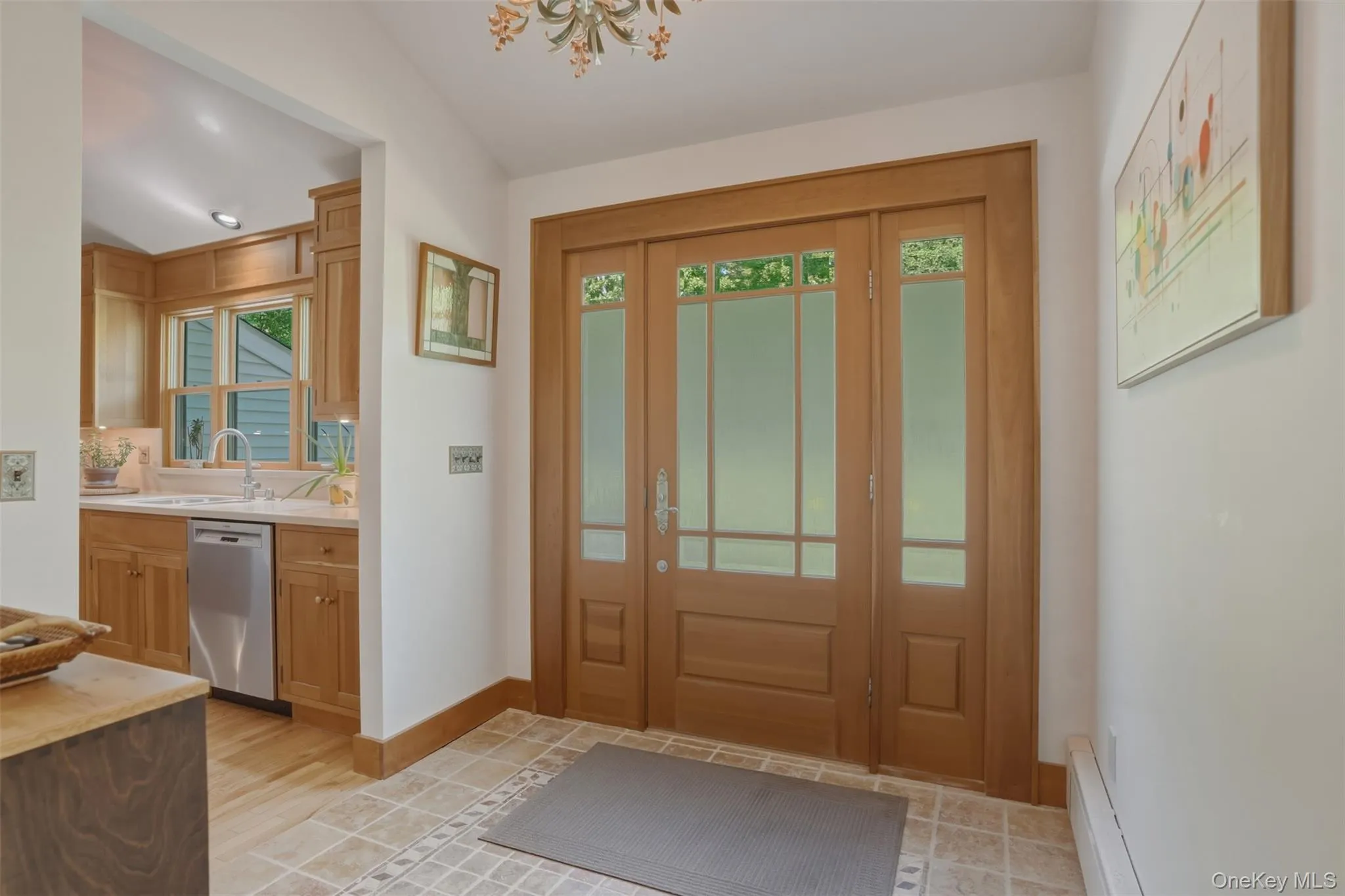 Glass doors keep foyer area bright. Glass doors keep foyer area bright.