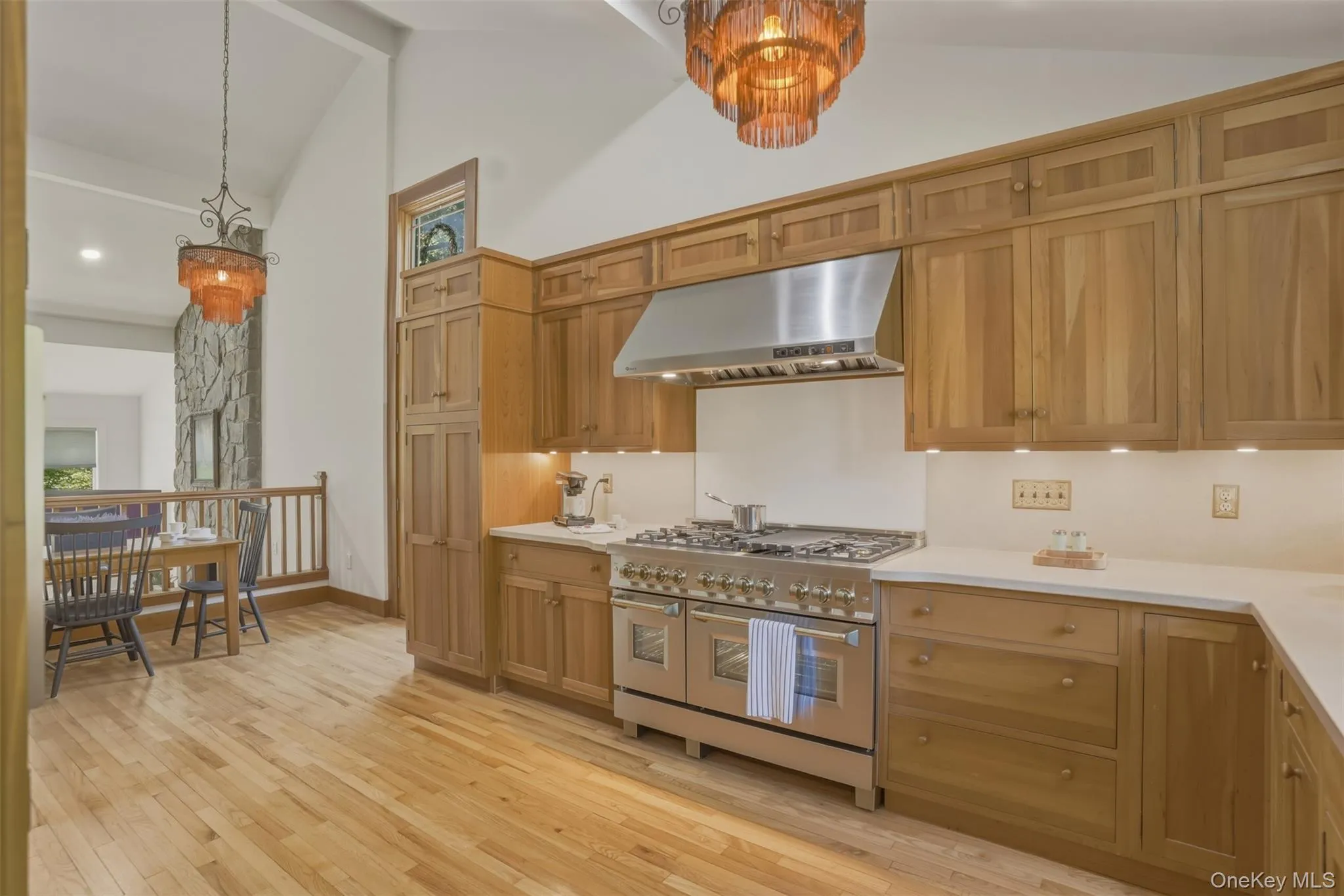 Chef's kitchen featuring a ZLINE 60-inch Dual Fuel Range and 9 burner stove. Chef's kitchen featuring a ZLINE 60-inch Dual Fuel Range and 9 burner stove.
